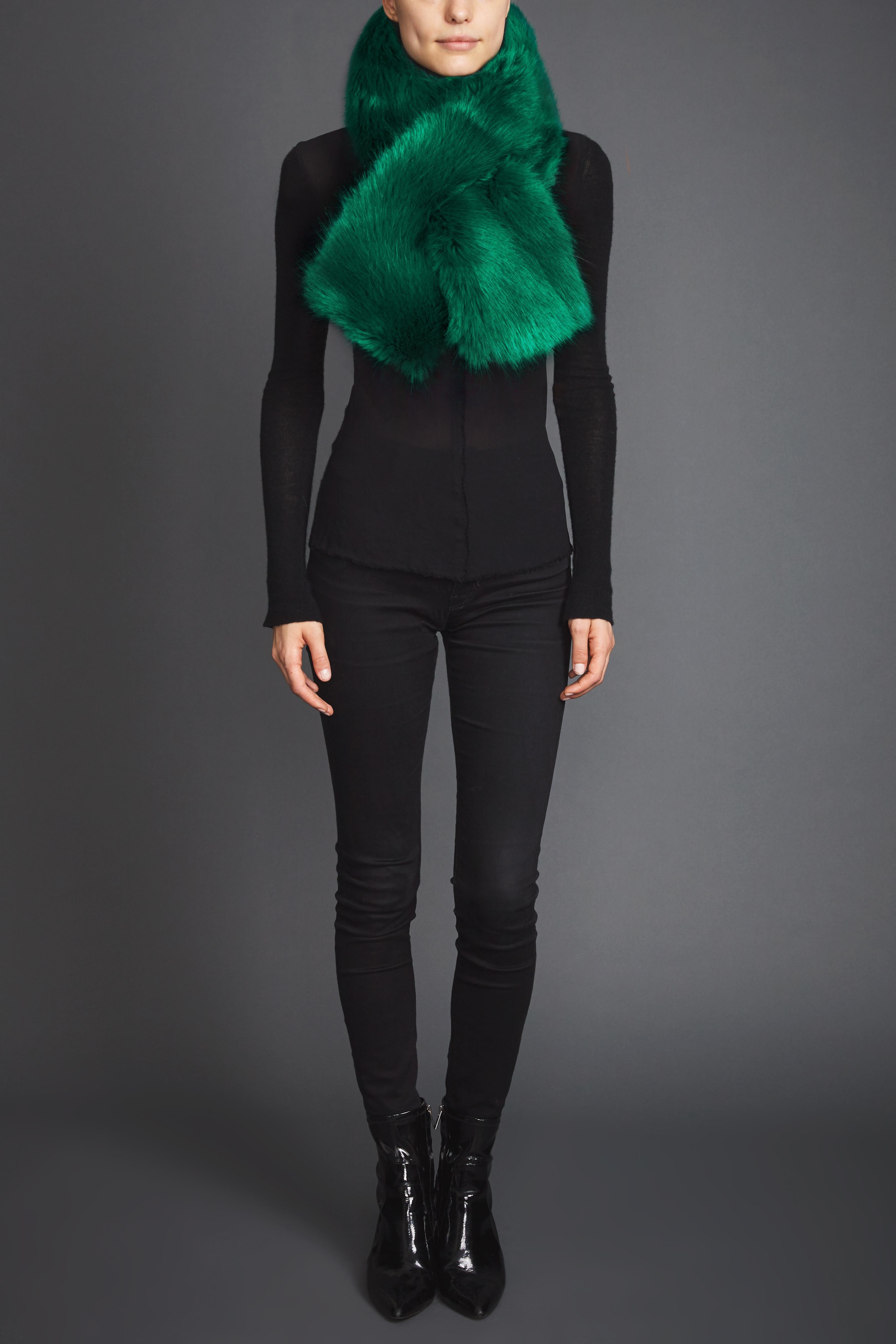 Cross-through Faux Fur Collar in Emerald Green

Details and Care:
Colour: Emerald Green
Luxurious Faux Fur
lined in 100% Acetate Satin
Special dry clean

Size and Fit:
Size fits all
Ties with hook and eyes