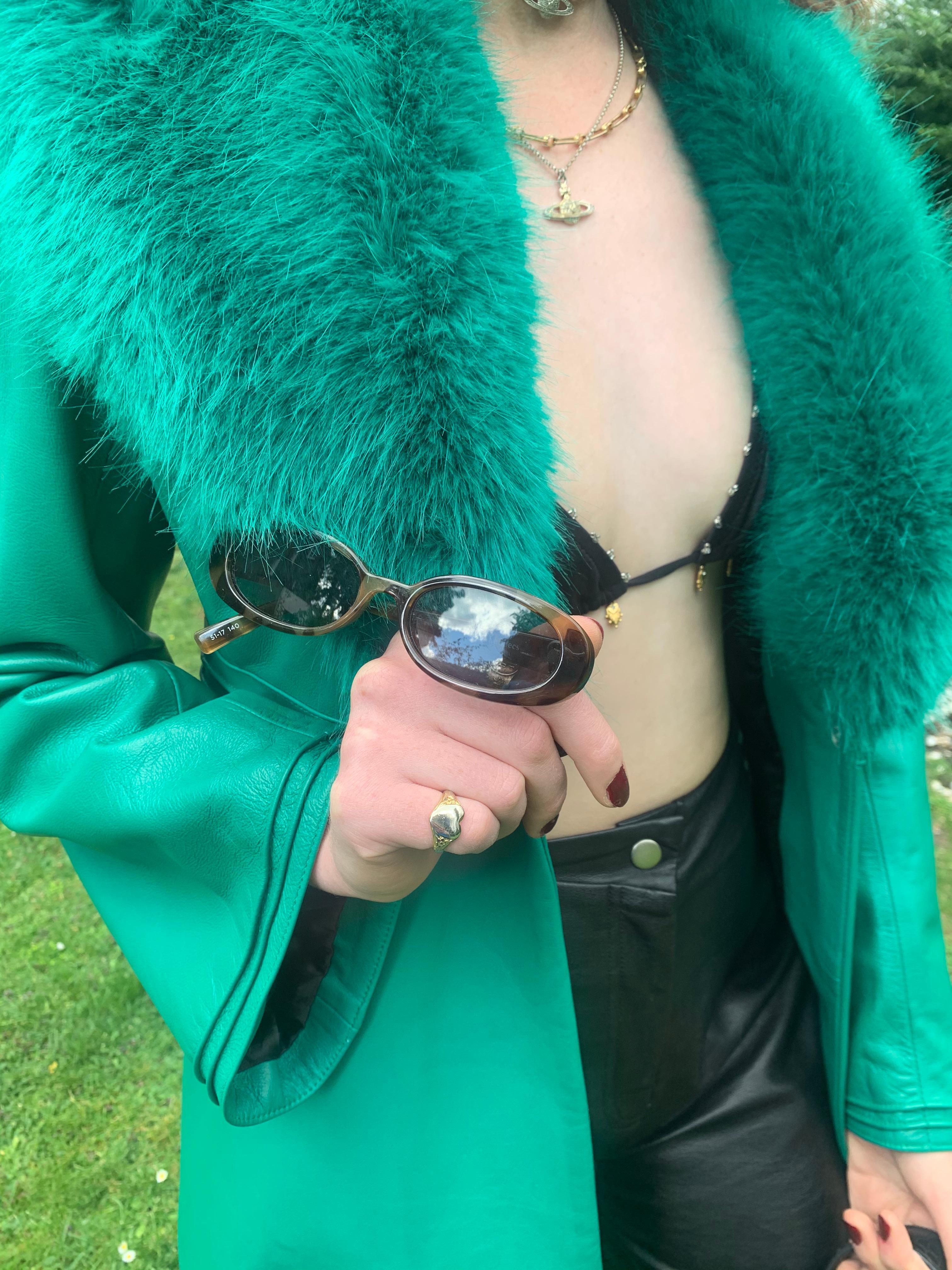 green leather coat with fur