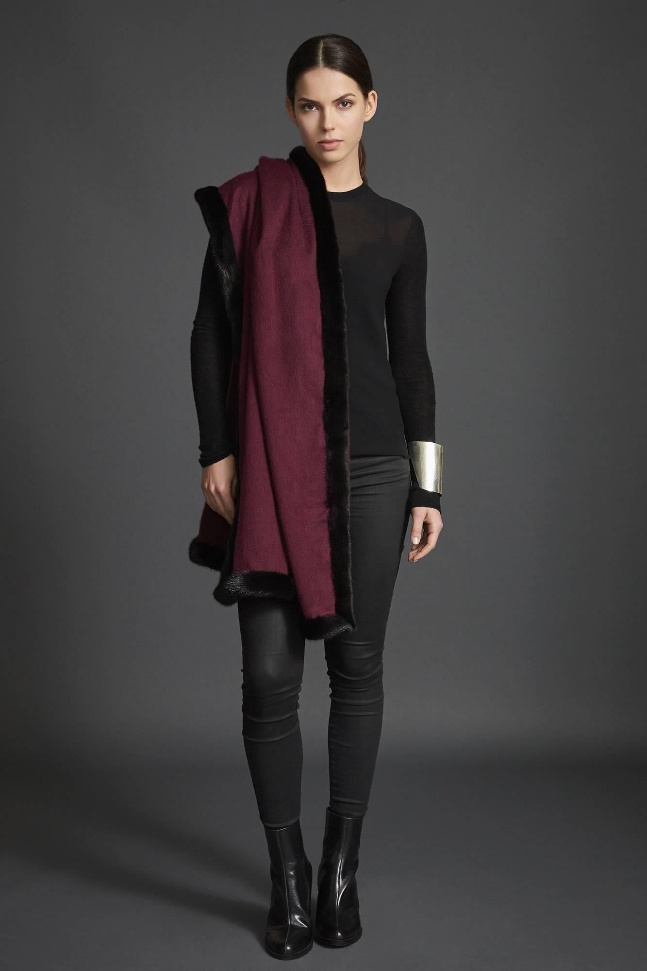 Verheyen London Mink Fur Trimmed Black & Burgundy Cashmere Shawl 

Verheyen London’s shawl is spun from the finest Scottish woven cashmere and finished with the most exquisite dyed mink. Its warmth envelopes you with luxury, perfect for travel and