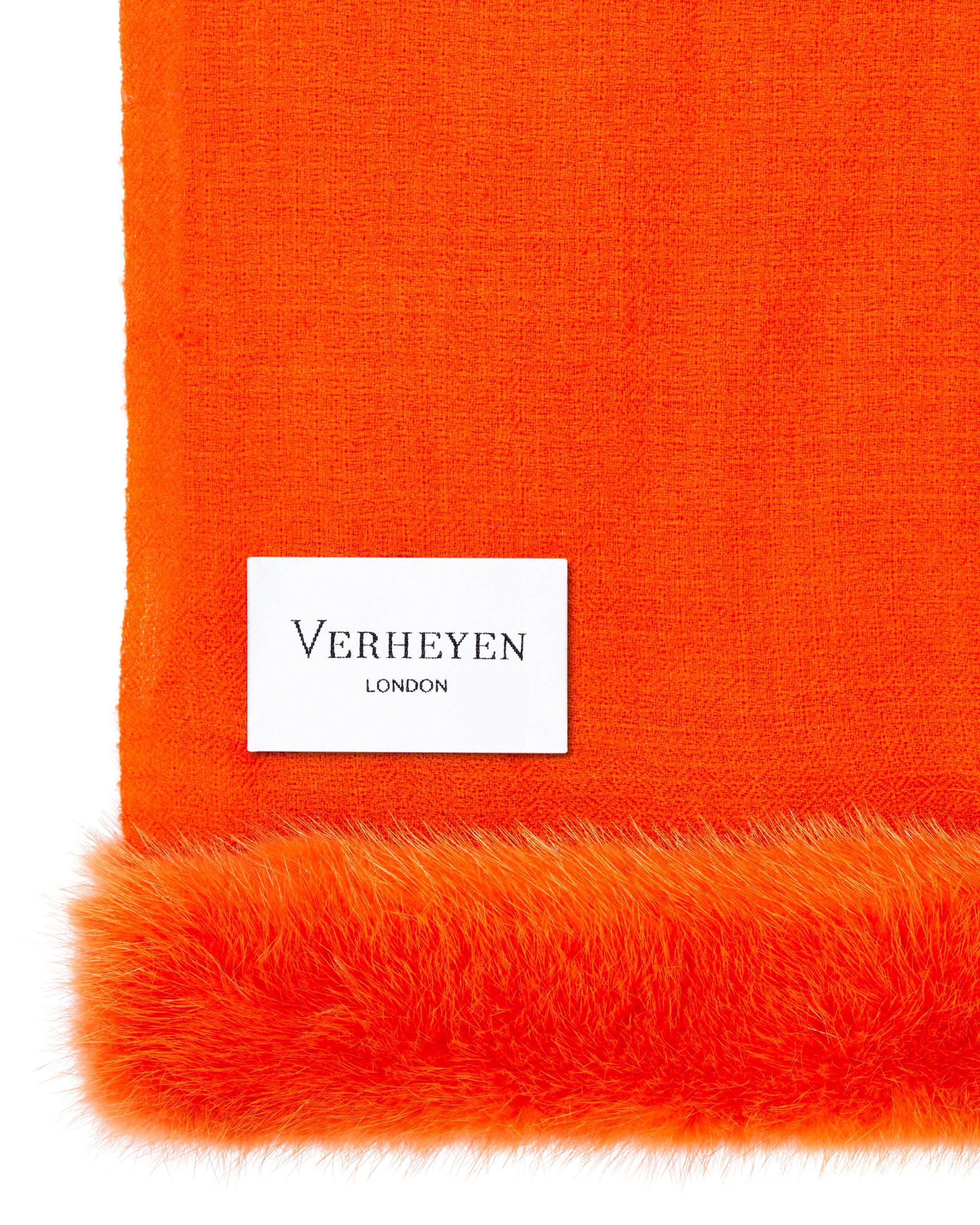 Verheyen London Handwoven Mink Fur Trimmed Orange Cashmere Shawl - Brand New 

Verheyen London’s shawl is spun from the finest lightweight handwoven cashmere from Kashmir and finished with the most exquisite dyed mink. Its warmth envelopes you with