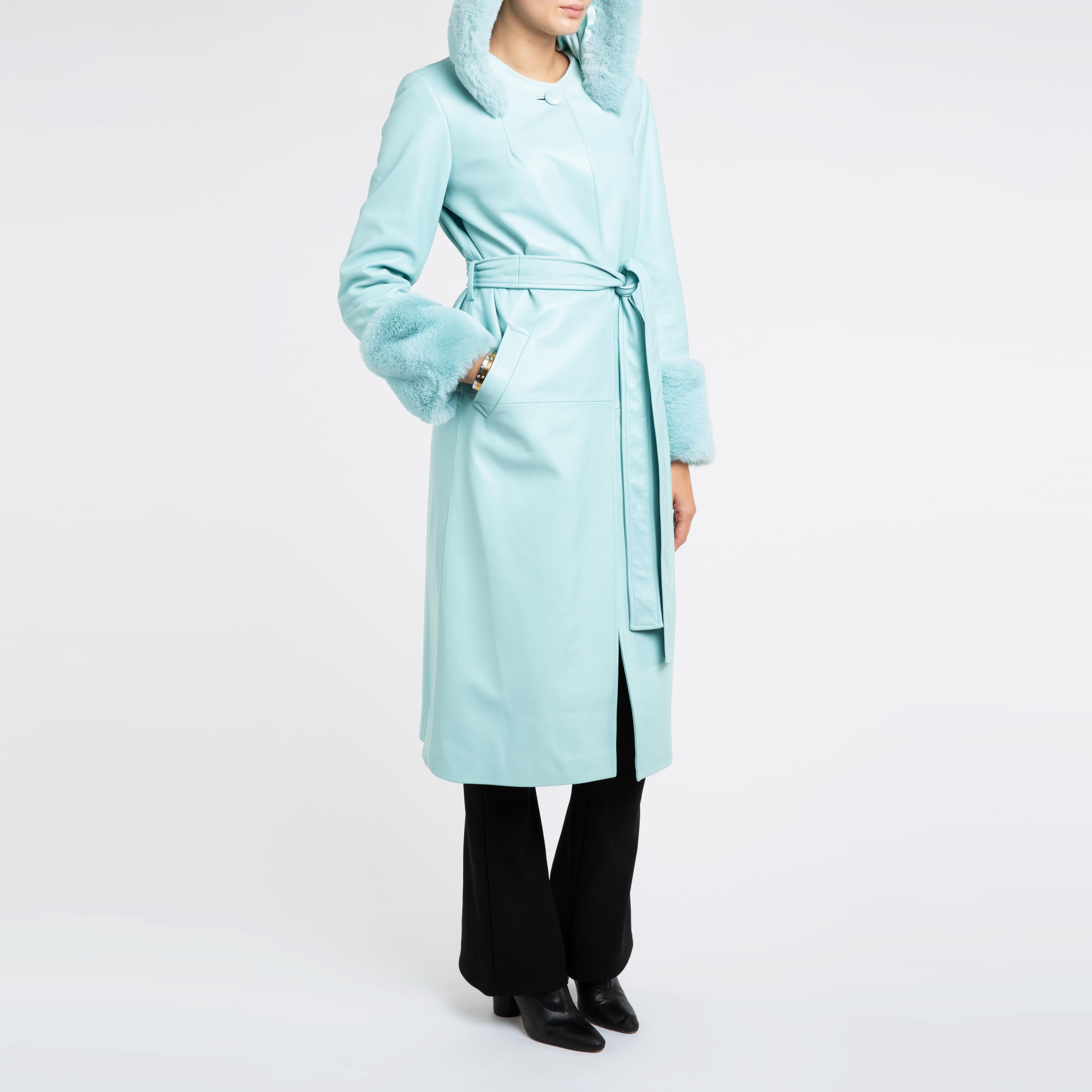 Verheyen London Hooded Leather Coat in Blue Aquamarine & Faux Fur - Size uk 10

Handmade in London, made with 100% Italian Lambs Leather and the highest quality of faux fur to match, this luxury item is an investment piece to wear for a lifetime. 