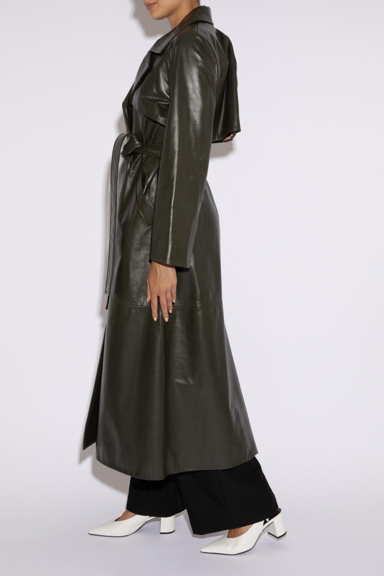Verheyen London Leather Trench Coat in Dark Khaki Green - Size uk 12

Handmade in London, made with 100% Italian Lambs Leather this luxury item is an investment piece to wear for a lifetime.  This piece is made by artisans in London, expert artisans