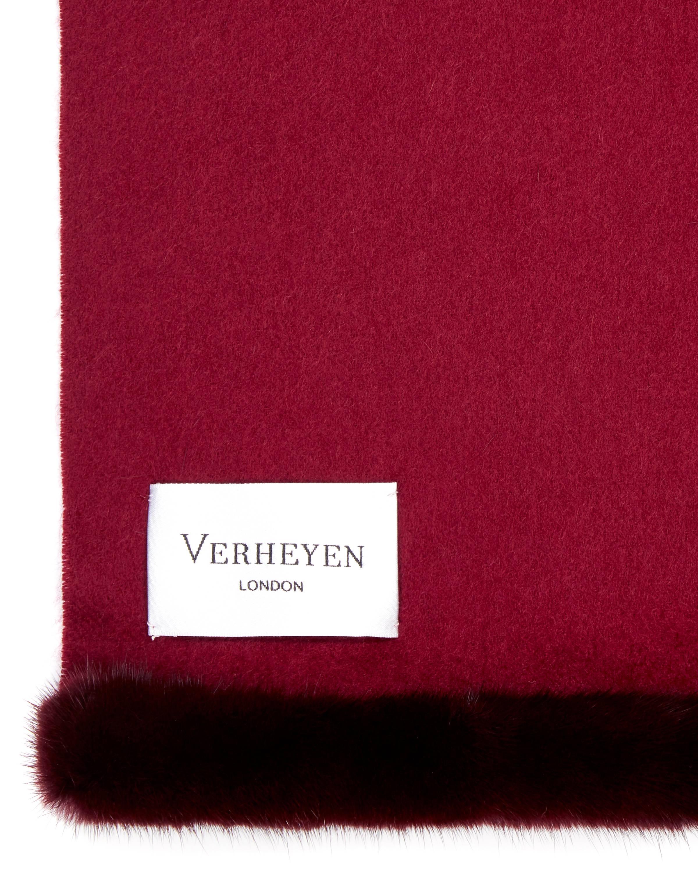 Verheyen London Mink Fur Trimmed Cashmere Scarf in Burgundy 

Verheyen London’s shawl is spun from the finest Scottish woven cashmere and finished with the most exquisite dyed mink. Its warmth envelopes you with luxury, perfect for travel and
