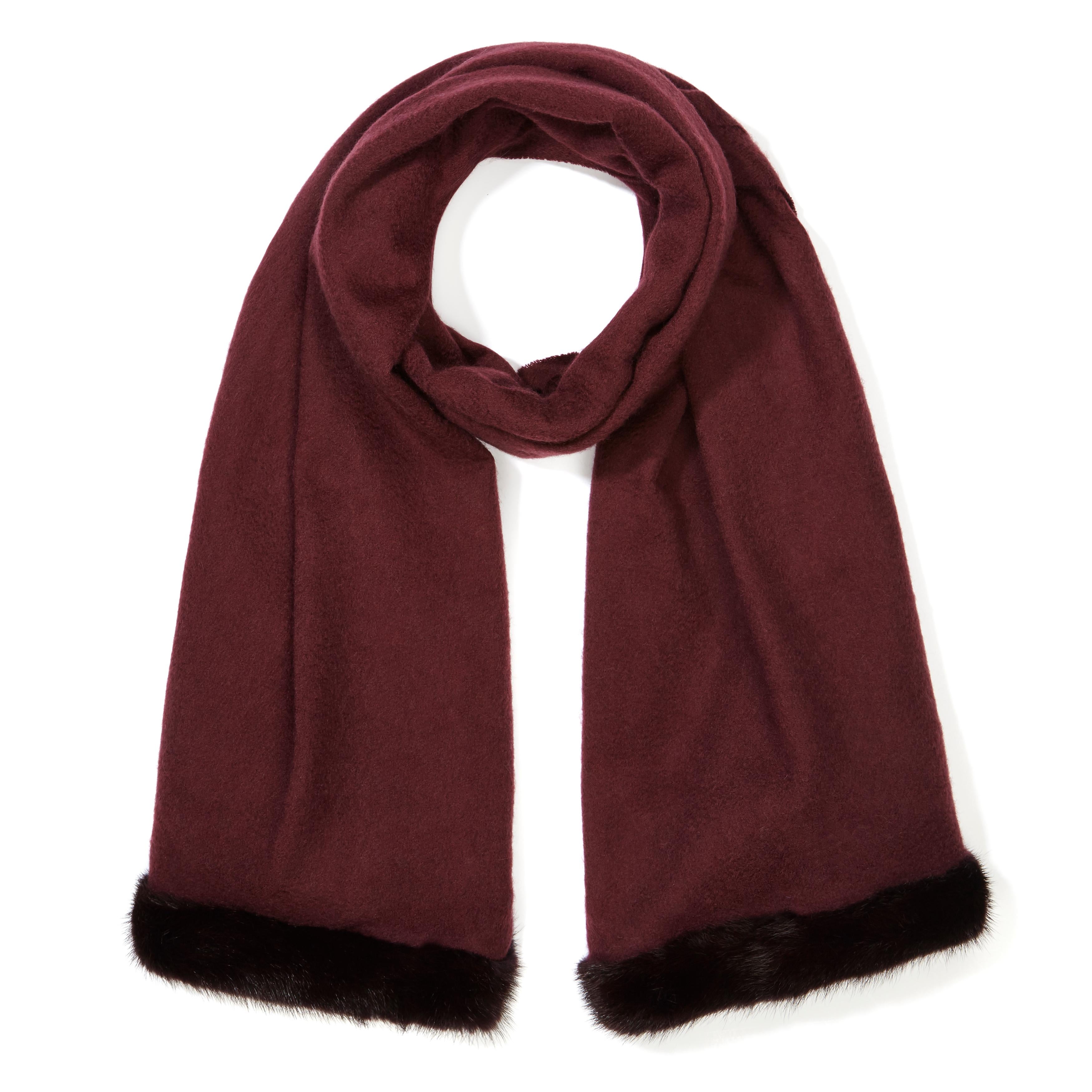 Verheyen London Mink Fur Trimmed Cashmere Shawl Scarf in Rich Burgundy Gift 

Verheyen London’s shawl is spun from the finest Scottish woven cashmere and finished with the most exquisite dyed mink. Its warmth envelopes you with luxury, perfect for