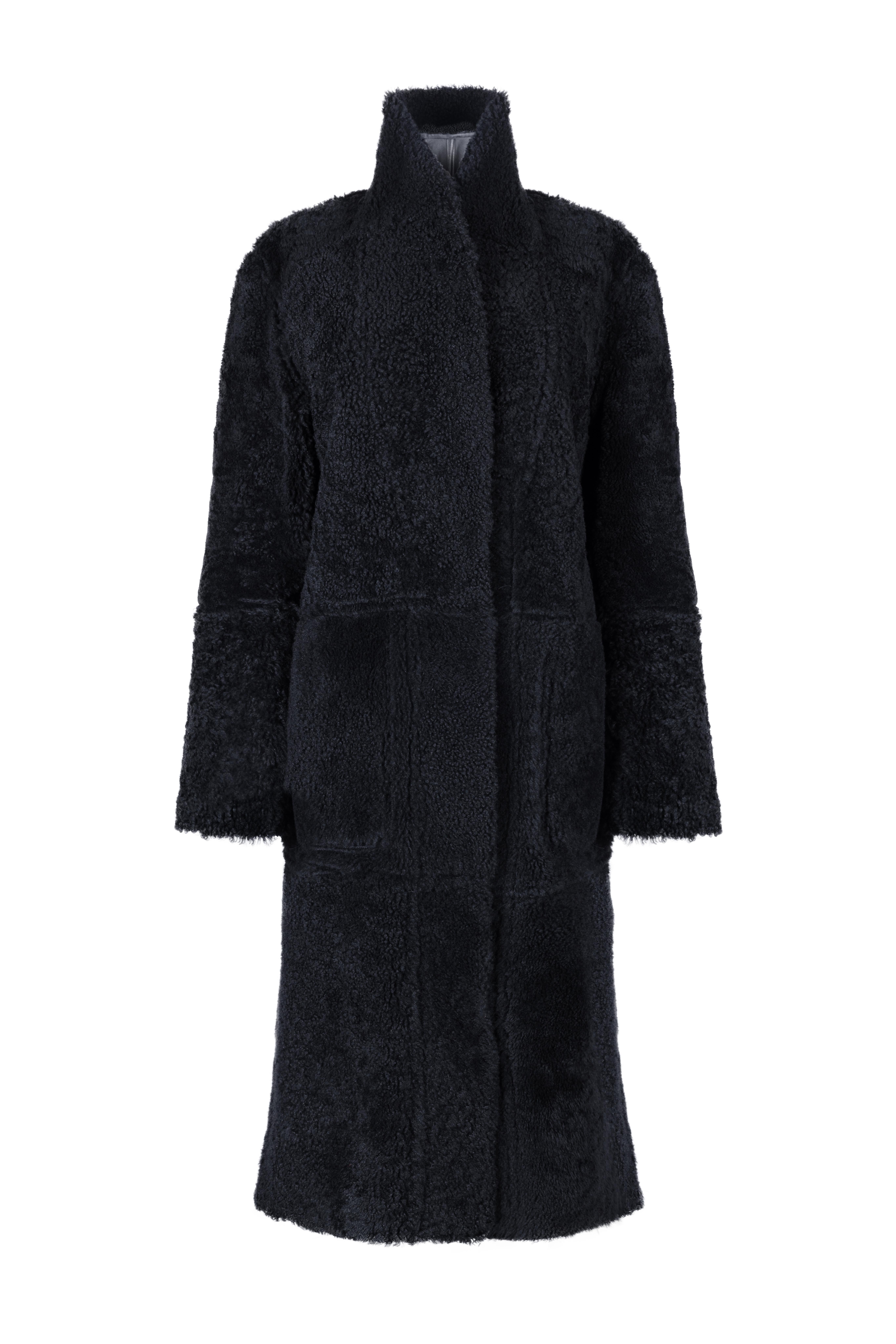 Cappotto in shearling di Verheyen London in nero  Taglia uk 6-16

Un cappotto da abbinare a jeans o vestiti e che ti terrà al riparo dal freddo. 
Questo modello longilineo è lusinghiero e facile da indossare con maglioni e altro grazie al suo taglio