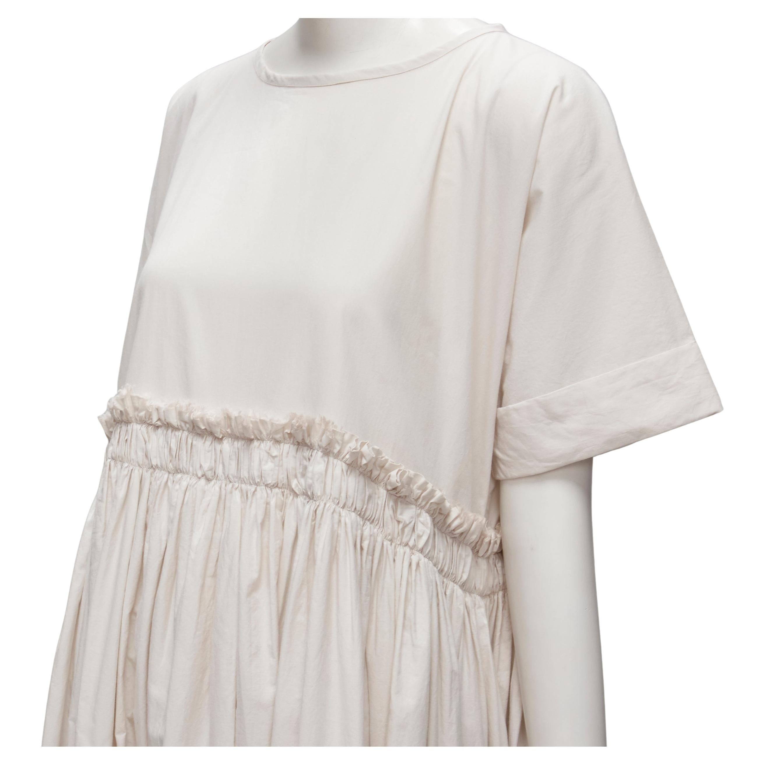 VERITECOEUR cotton stone grey gather waist rolled sleeve round neck flared dress
Reference: LNKO/A02049
Brand: Veritecoeur
Material: Cotton
Color: Stone
Pattern: Solid
Closure: Pullover

CONDITION:
Condition: Excellent, this item was pre-owned and