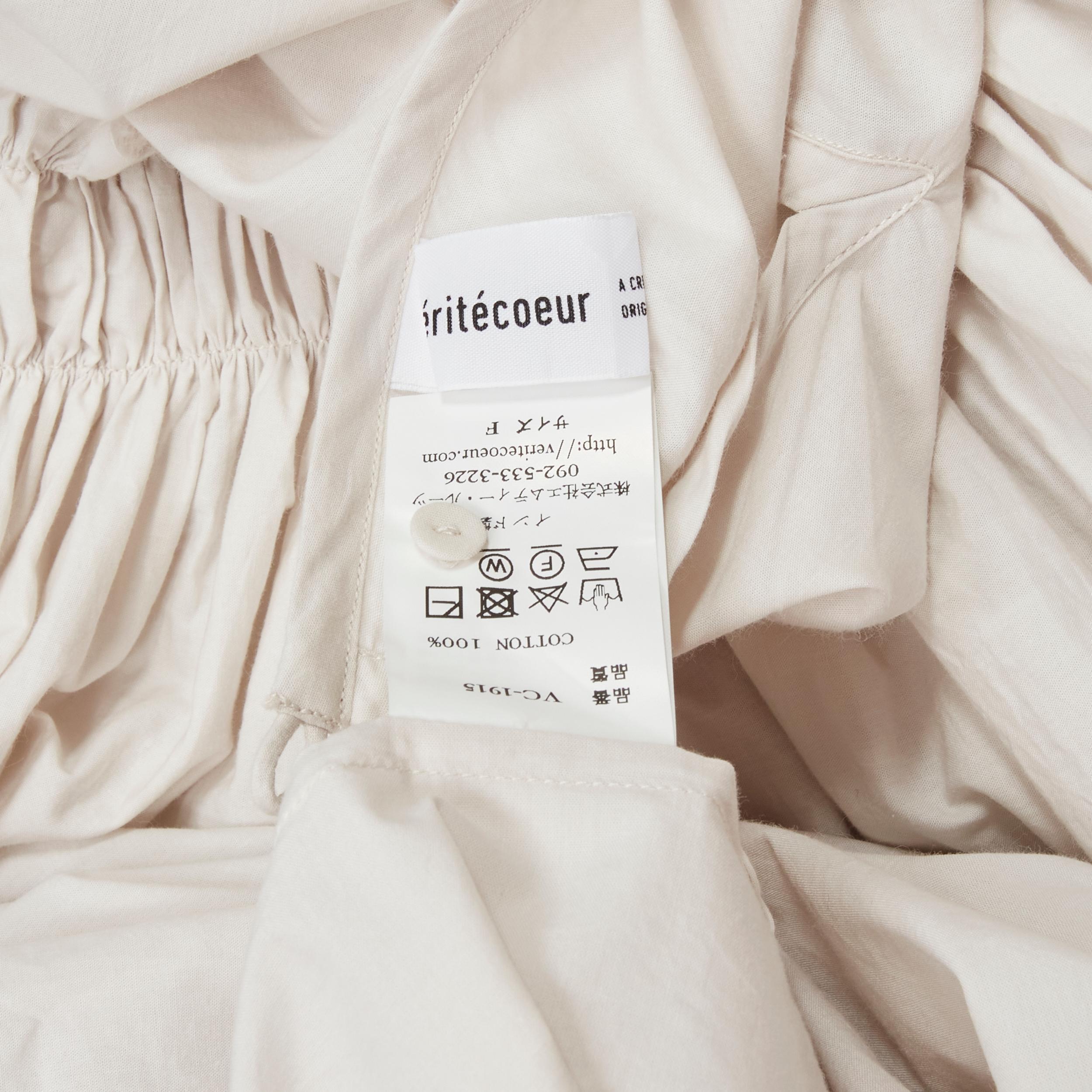 VERITECOEUR cotton stone grey gather waist rolled sleeve round neck flared dress For Sale 3