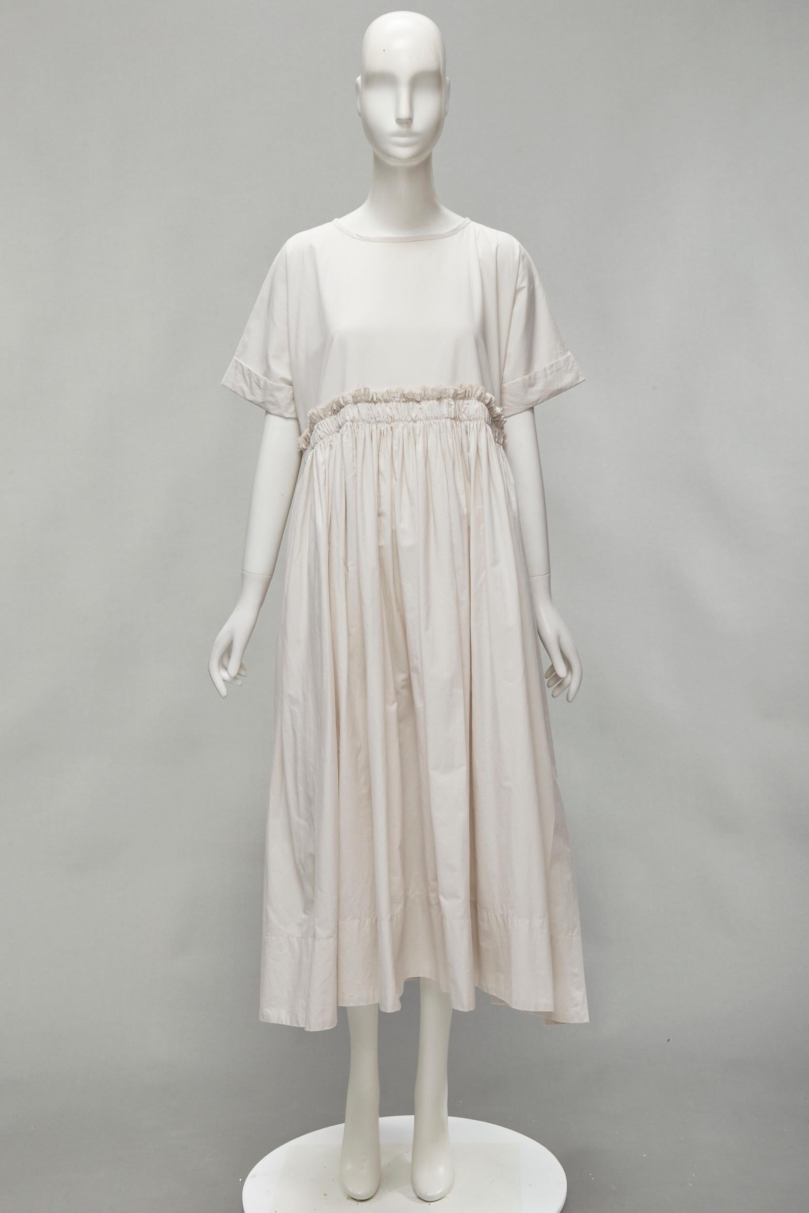 VERITECOEUR cotton stone grey gather waist rolled sleeve round neck flared dress For Sale 4