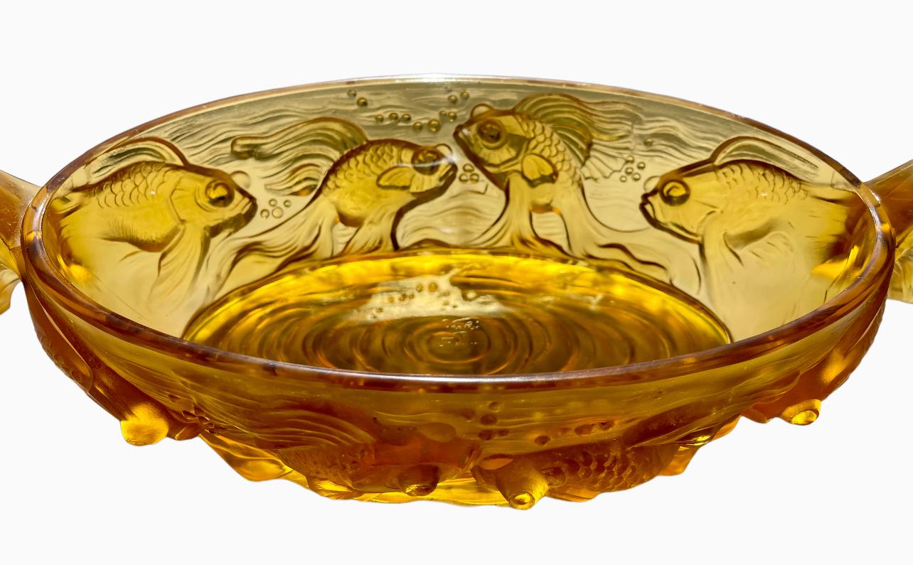 Centerpiece forming a planter in opalescent amber glass signed 