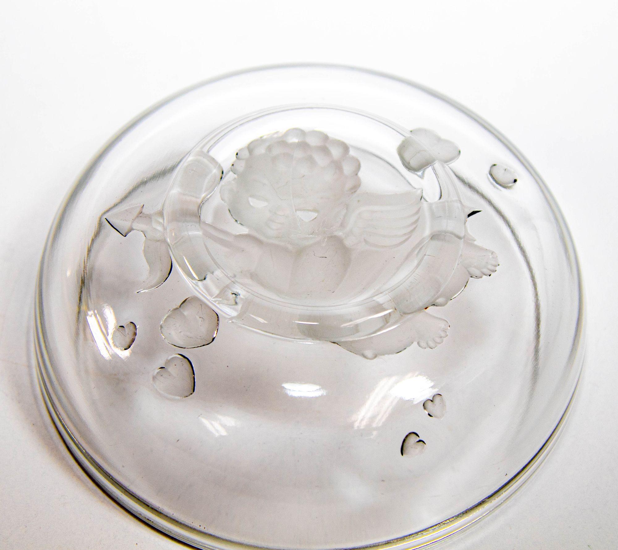 VVintage Signed Verlys crystal glass round bowl with Cupid Cherub angel with a bow.
A Lalique-style glass, a vintage Verlys opalescent glass Art Deco style satin embossed frosted clear glass dish with cupid and hearts candy trinket catchall vide
