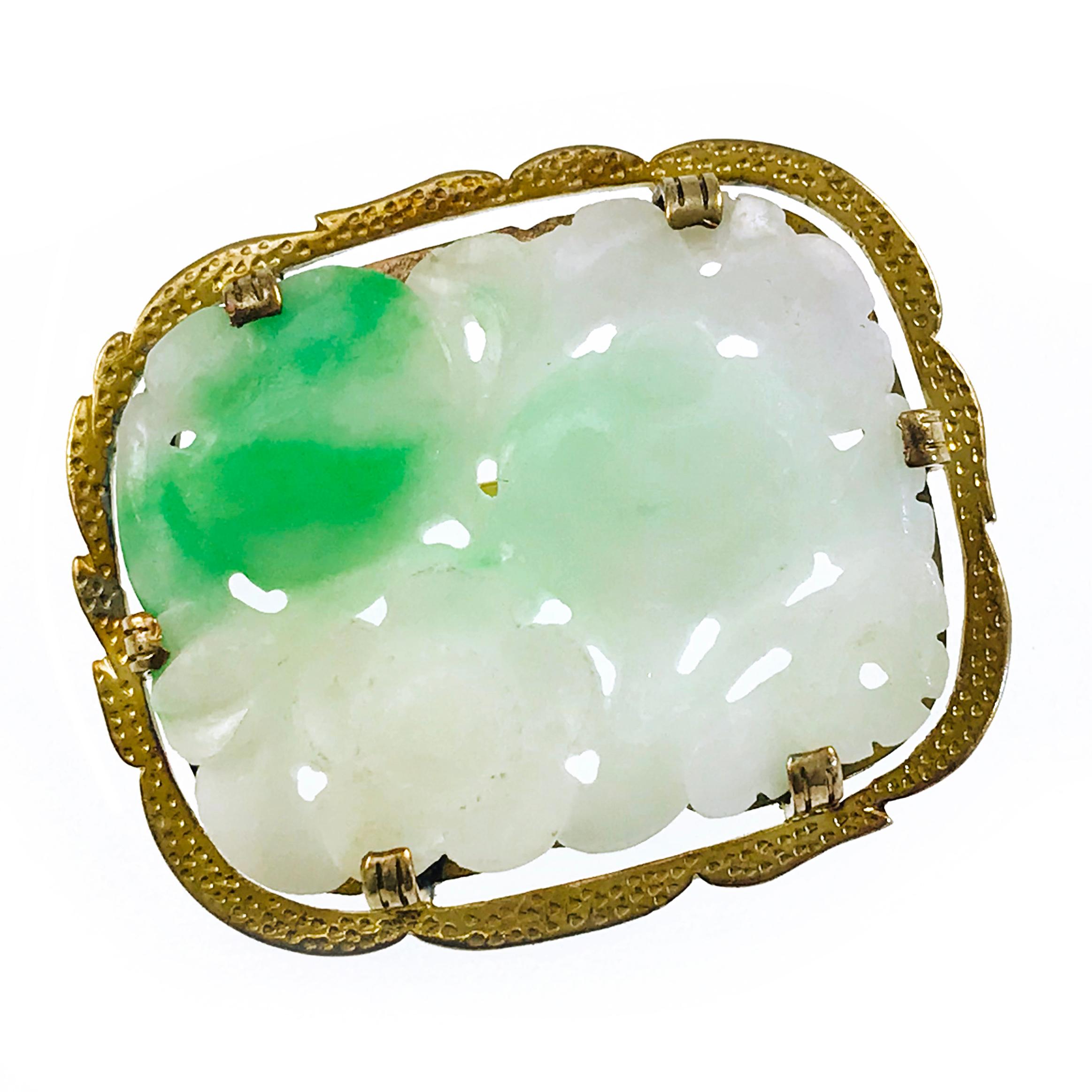 Vermeil Carved Moss-in-Snow Jade Brooch/Pin. The Jade is bright green on the top left side and the rest of the jade is white with hints of green, hence moss-in-snow jade. The motif is flowers and leaves with the surrounding silver in a dimpled