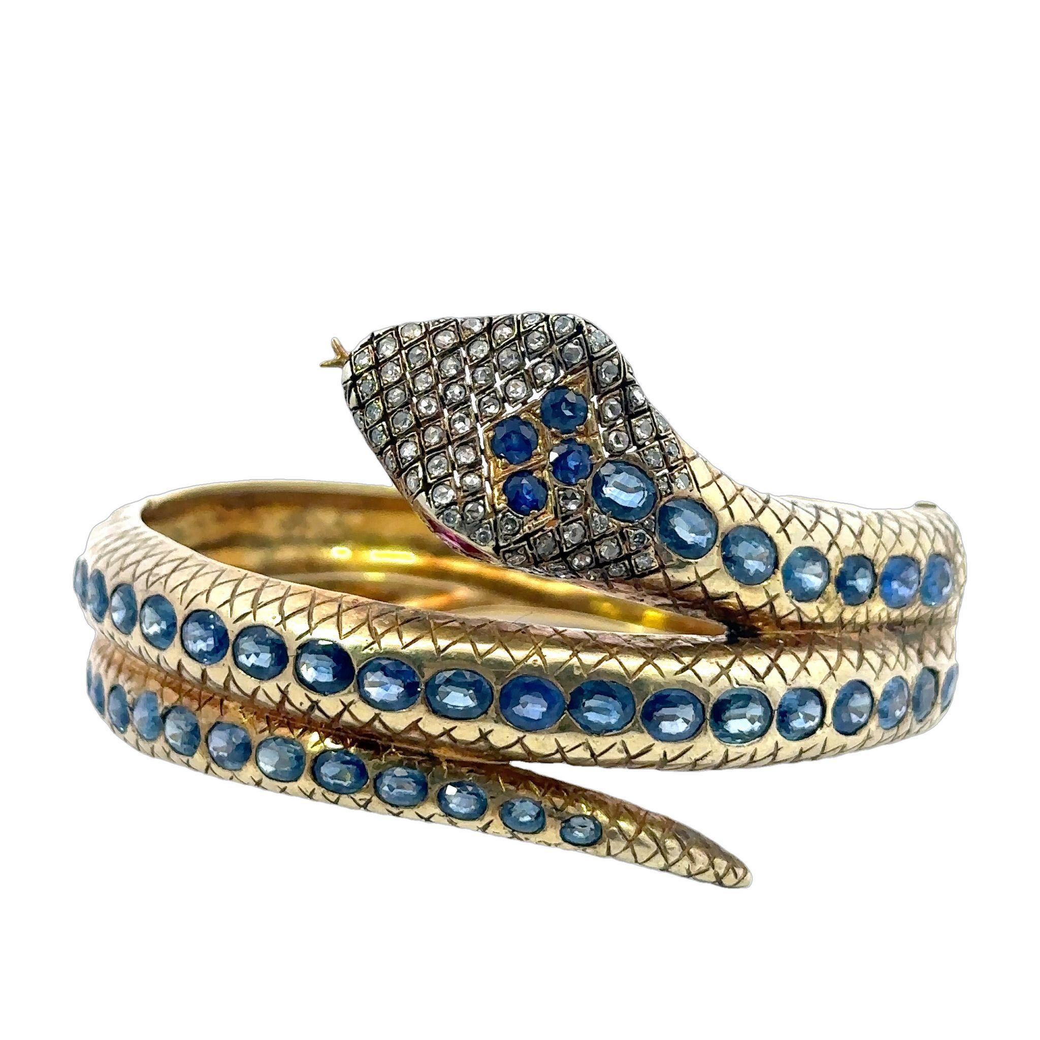 Vermeil Sapphire Snake Bangle Bracelet Gold, Silver ~9.6ct GIA Natural Sapphire

This exceptional bangle bracelet is a true work of art, crafted in vermeil and intricately designed to resemble a coiled snake. Its form wraps gracefully around the