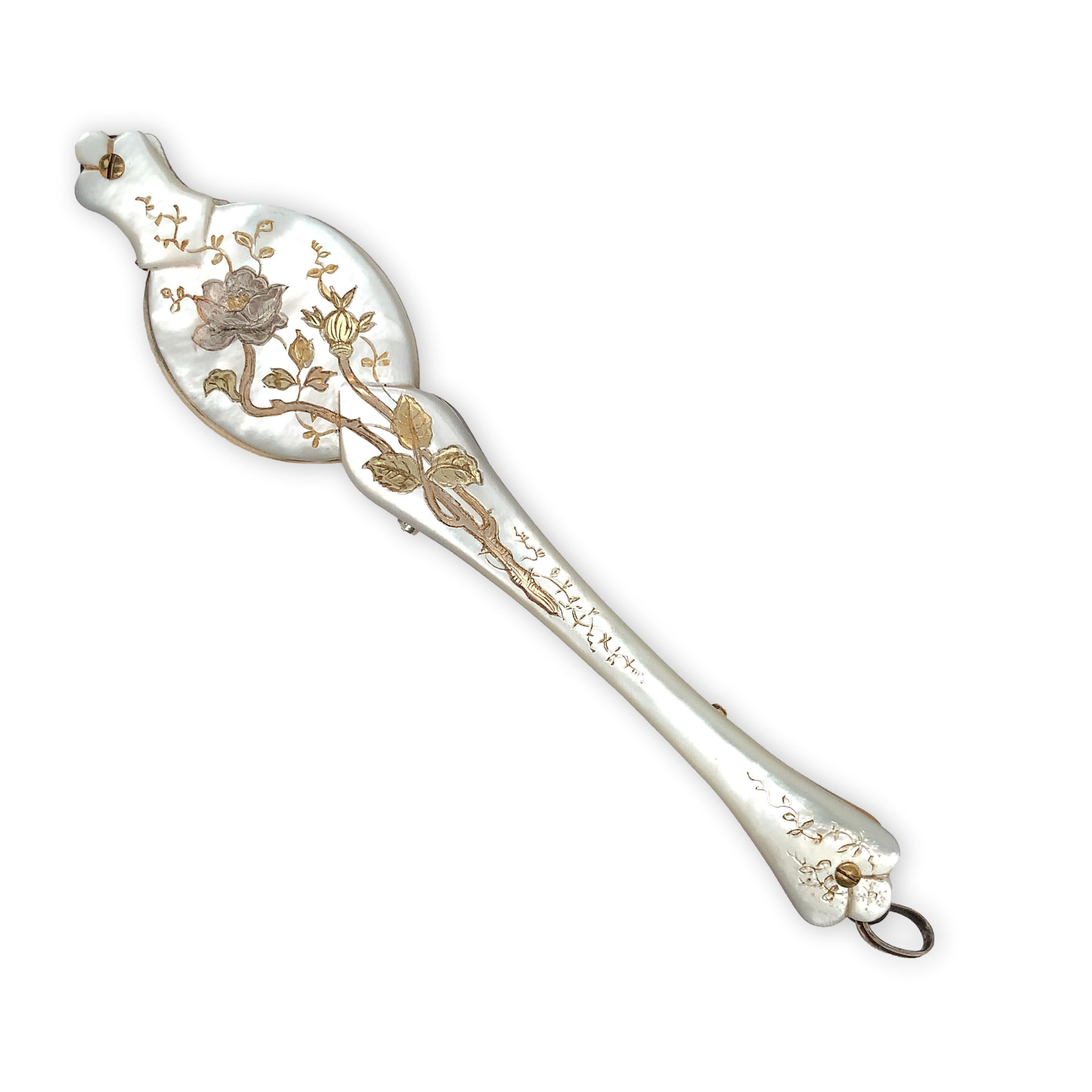 Vermeil Victorian French sterling lorgnette with original glasses decorated with mother of pearl shell. The lorgnette measures 5 7/8