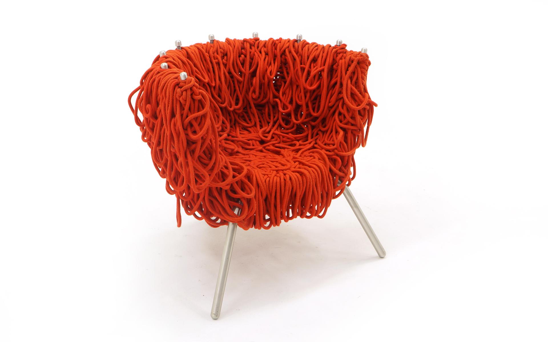Rare Vermelha chair by Fernando and Humberto Campana for Edra. Red rope covers the powder coated steel and aluminum frame. Very good condition.
Brothers, Fernando (born 1961) and Humberto (born 1953) founded Estudio Campana in 1983 and quickly