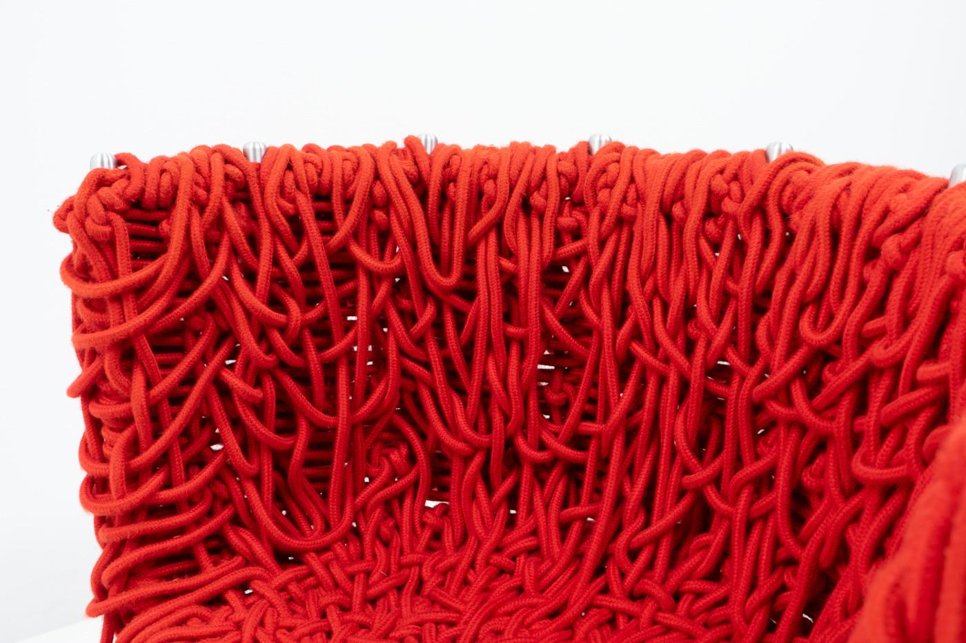 The Vermelha Chair by the Campana Brothers, stands out as a distinctive piece of contemporary design. 

Infused with inspiration from Brazilian culture, the chair showcases a unique and intricate design, embodying the avant-garde style of the