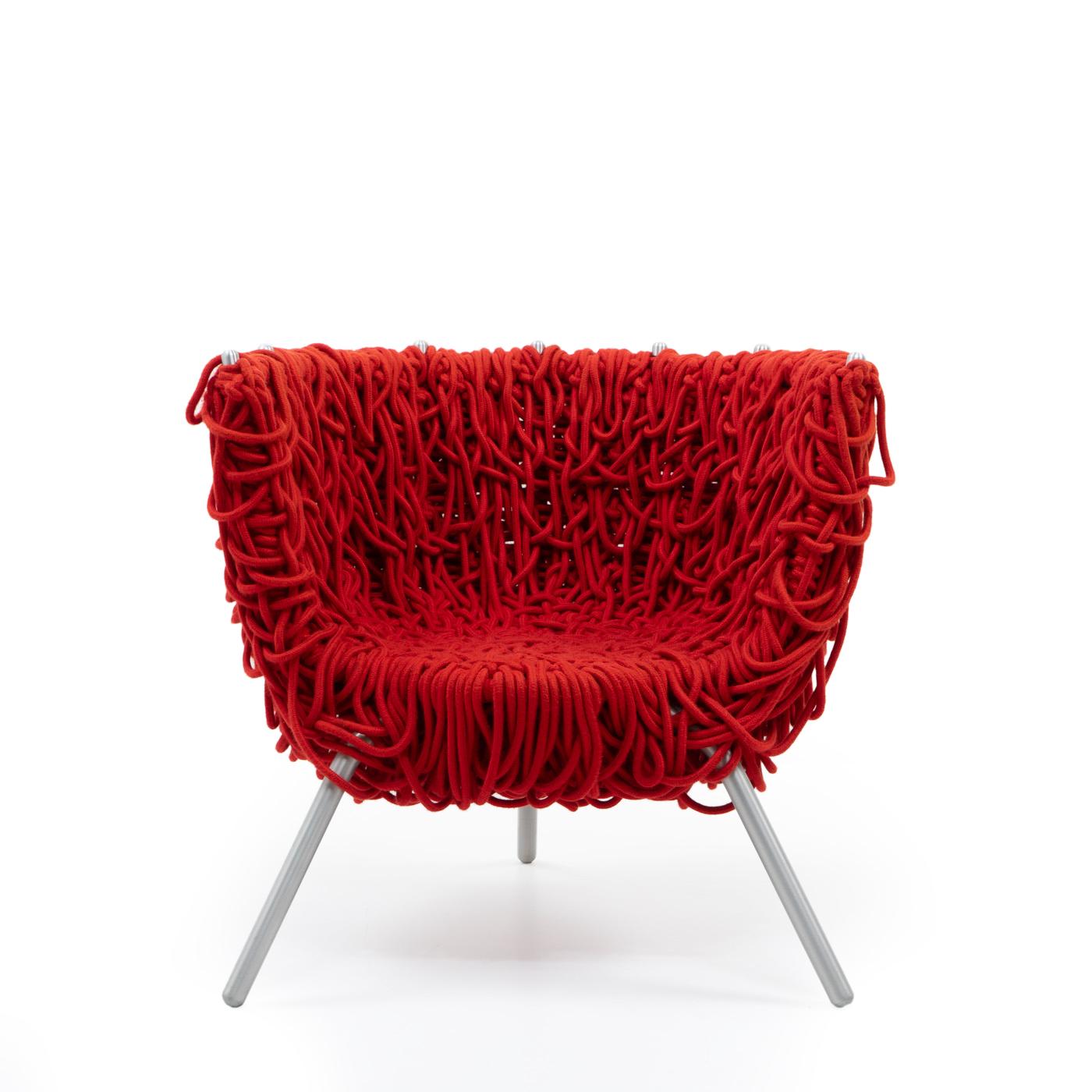 The Vermelha Chair by the Campana Brothers, stands out as a distinctive piece of contemporary design. 

Infused with inspiration from Brazilian culture, the chair showcases a unique and intricate design, embodying the avant-garde style of the