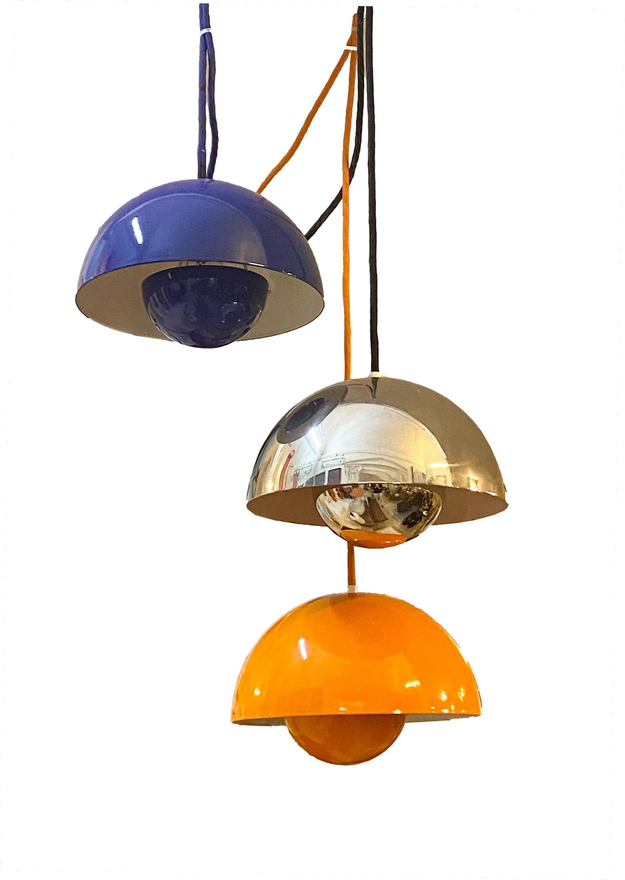 erner Panton flowerpot pendant light for Louis Poulsen, Denmark designed in 1969.

This pendant is an early example of the Panton flowerpot model and feature an orange enamel lampshade consisting of two semi-circular spheres facing each other. The