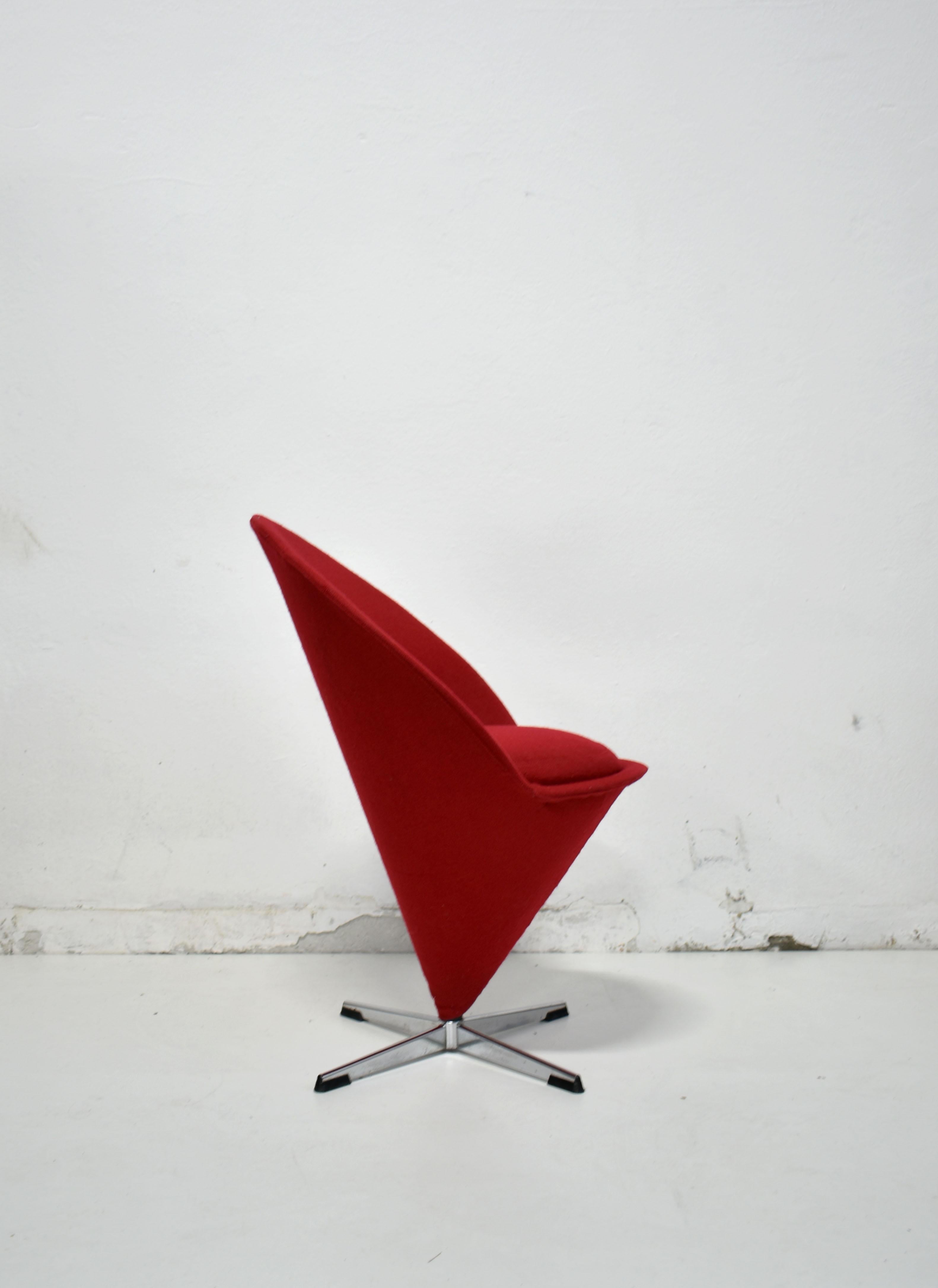 Iconic swivel 'Cone' chair designed in 1958 by famous Danish designer Verner Panton.

Made by Plus-Linje, Denmark. Production started in 1958.

The chair has original upholstery. Structure and legs are made of chrome-plated steel.