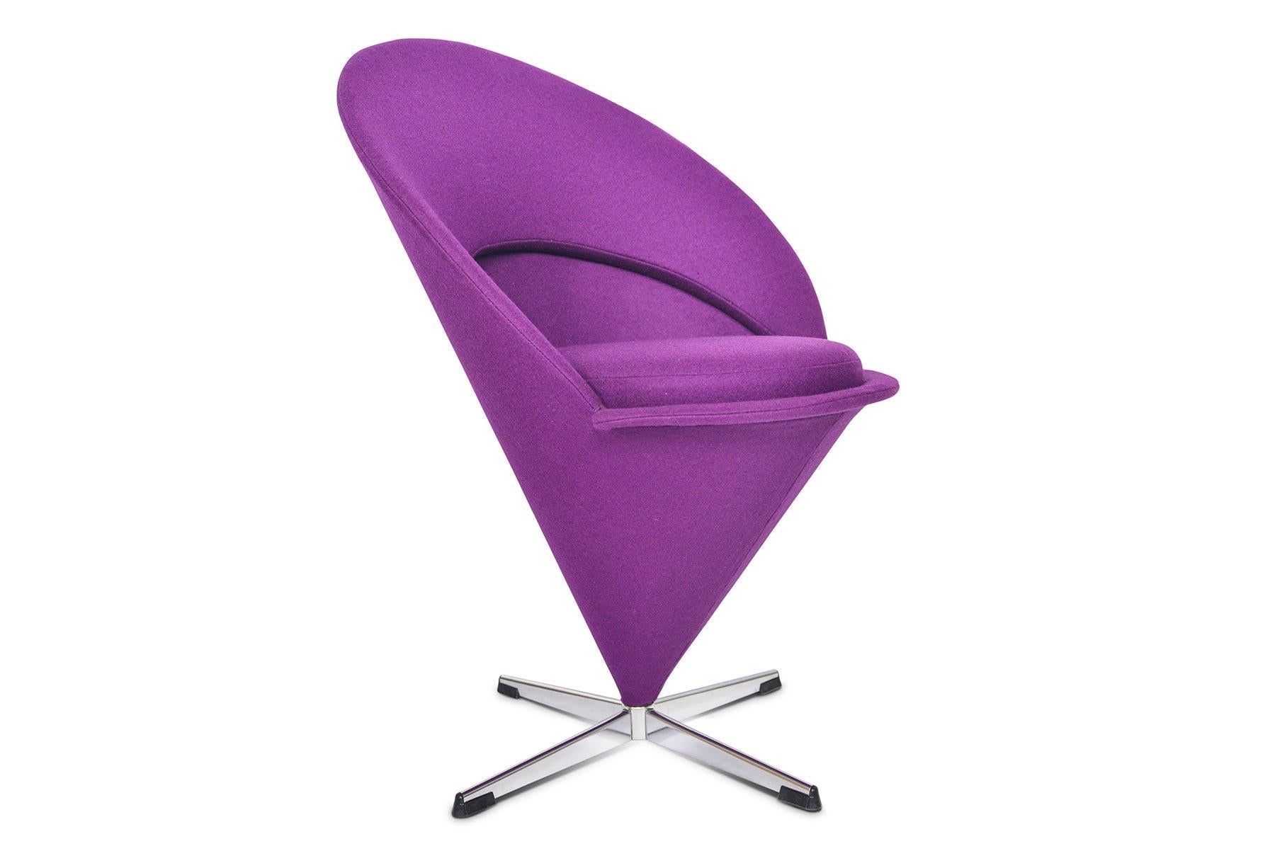 Fully restored in to its original glory, this cone chair by Verner Panton has been newly recovered in provocative purple felted wool by Kvadrat. The bold design offers a padded backrest and removable seat bottom. The swivel base offers 360° of