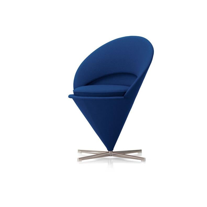 Chair designed by Verner Panton in 1958.
Manufactured by Vitra, Switzerland.

Verner Panton originally designed the Cone Chair for a restaurant in Denmark. It takes its shape from the classic geometric figure for which it is named. The padded