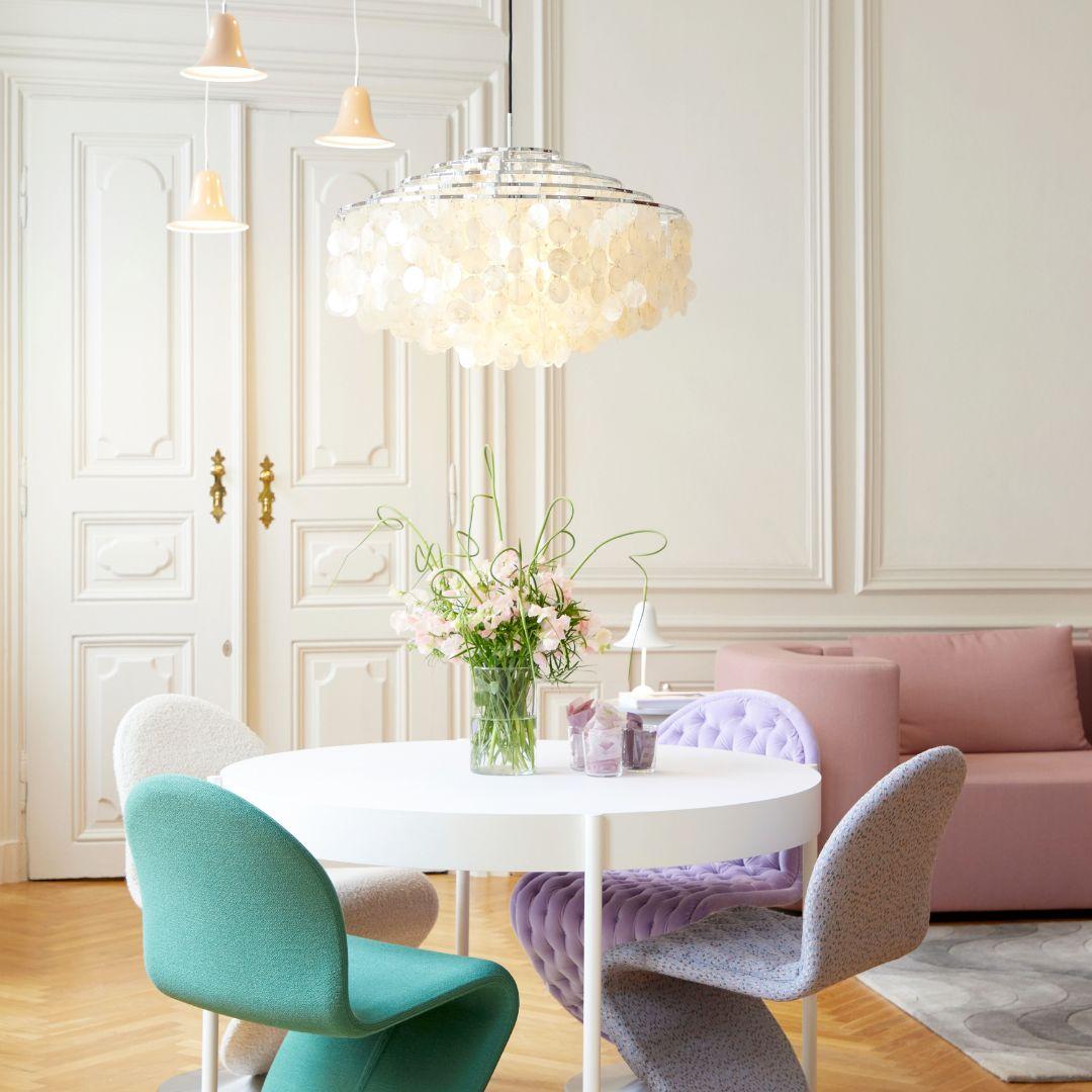 Verner Panton 'Fun 11DM' pendant lamp in sea shells and chrome for Verpan

Verner Panton was one of Denmark's most legendary modern furniture and interior designers. His innovative experimentation with new materials, bold shapes and vibrant colors