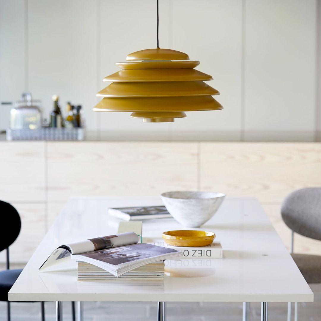Verner Panton 'Hive' pendant lamp in yellow powder coated aluminum for Verpan

Verner Panton was one of Denmark's most legendary modern furniture and interior designers. His innovative experimentation with new materials, bold shapes and vibrant