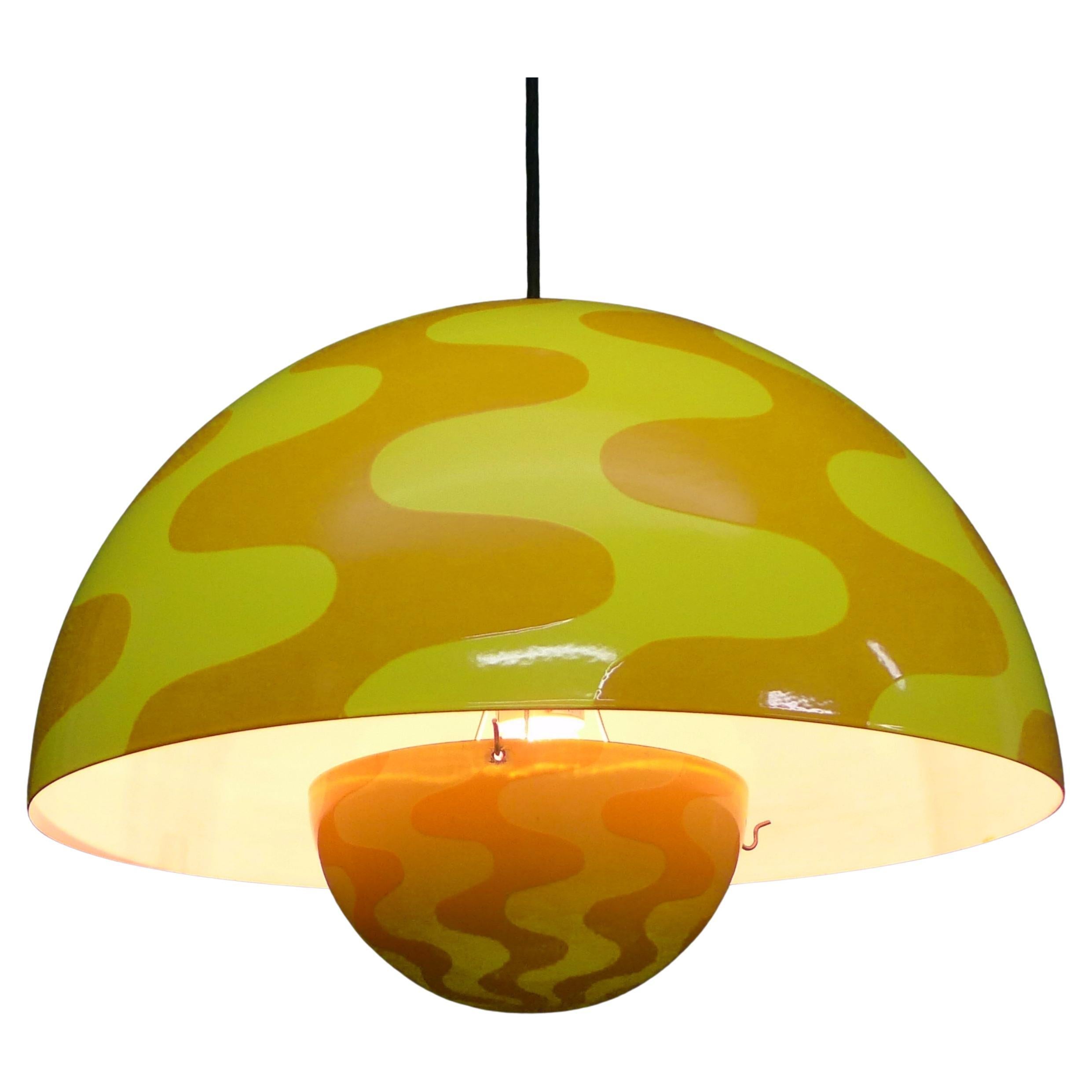 Verner Panton, Danish
'Flowerpot' Pendant Light, model VP2
designed and manufactured late 1960s

This is the rare larger version, model VP2, with shade measuring 50cm diameter, 33cm high

Yellow and Orange 'Op Art' design with swirling alternate
