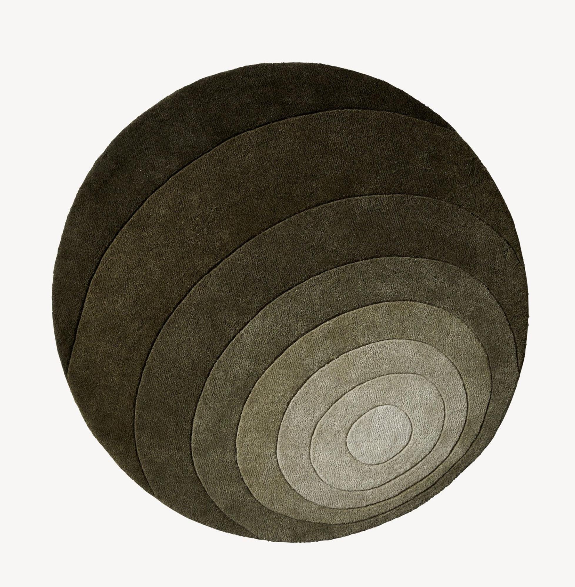 Verner Panton 'Luna' Rug 120cm by Verpan. Current production.

As well as adding a sculptural feature to a room, rugs also serve to emphasize and/or transform the dimensions of the space. All Verpan carpets are made from hand-woven 100% New Zealand