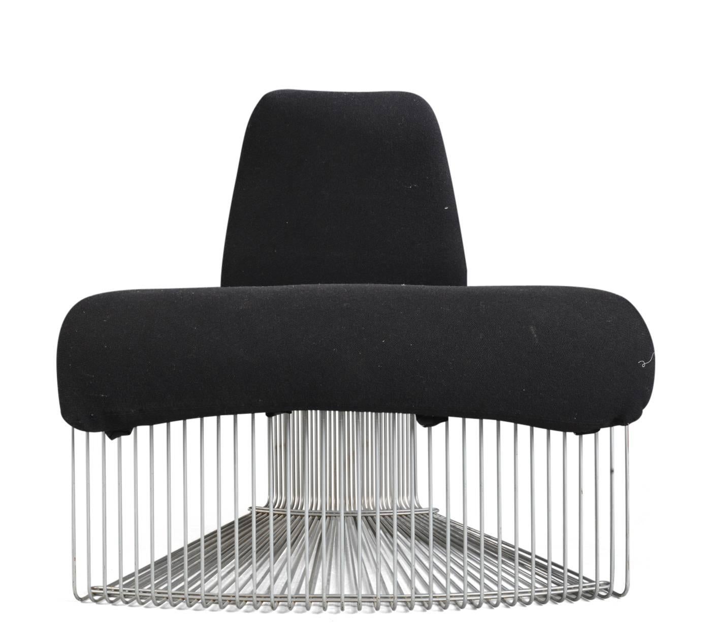 Verner Panton. Pantonova module armchair with cushion of black wool. Measures: Height without cushion: 65 cm. SH. ca. 39 cm. Occurrence of wear.