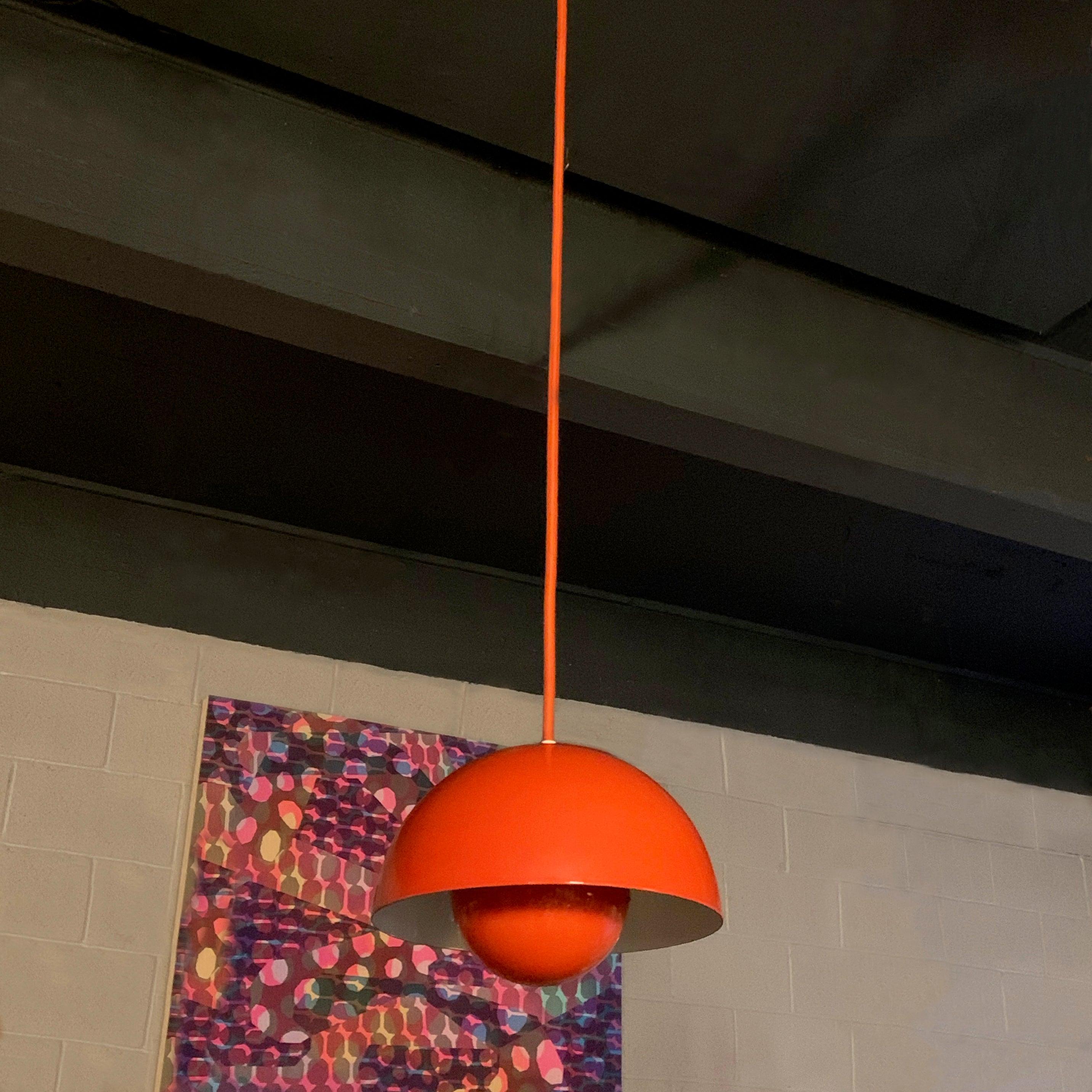 Iconic Danish modern, orange, flower pot, pendant light by Verner Panton for Louis Poulsen is wired with 6 ft of orange cloth cord.