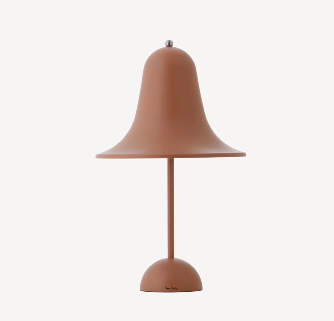 Verner Panton 'Pantop Portable' table lamp in 'Terracotta' for Verpan. Designed in 1980. New, current production.

This is a versatile smaller and wireless version of the 'Pantop' table lamp, usb-chargeable. 

The elegant Pantop line was