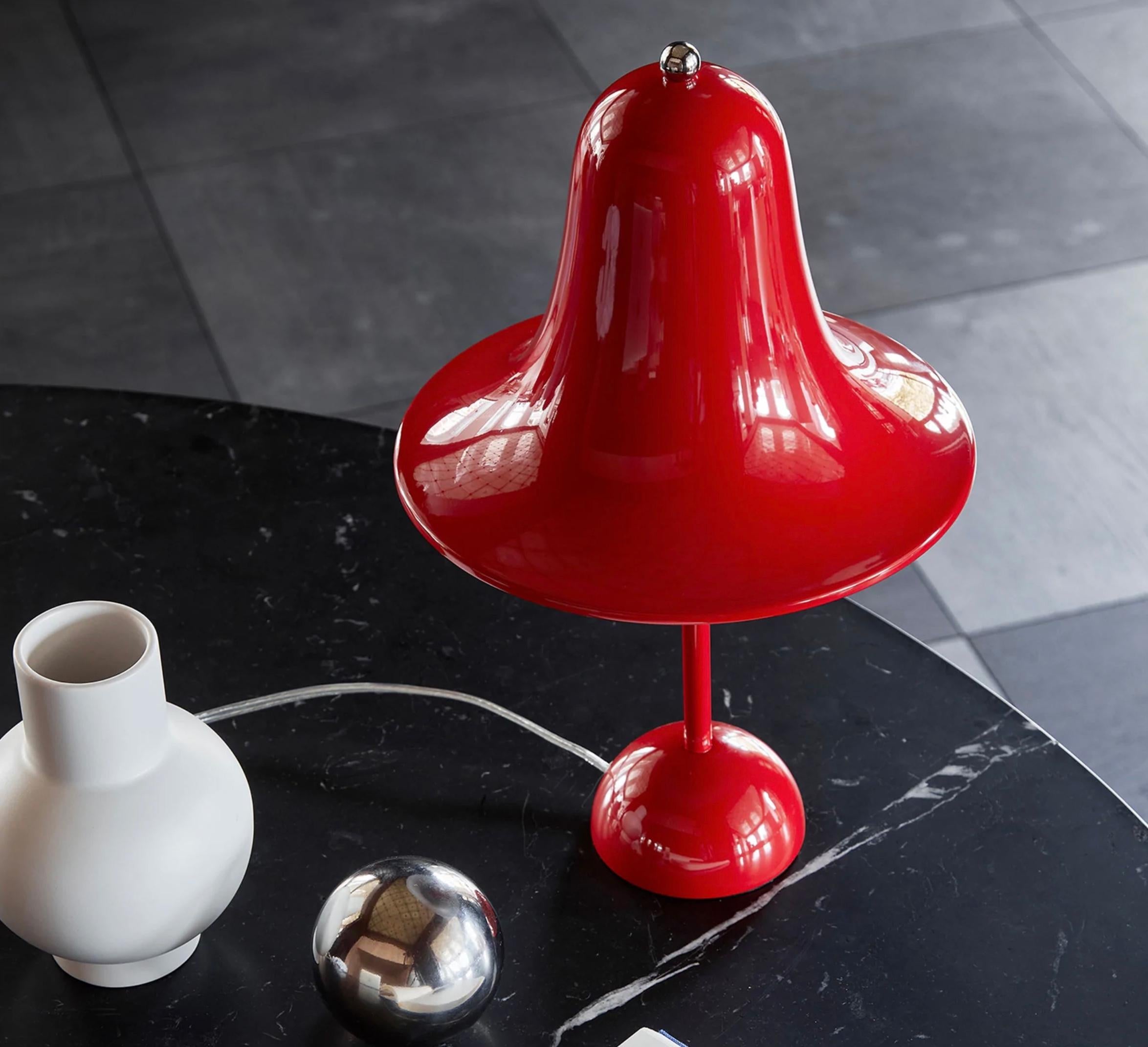 Verner Panton 'Pantop' table lamp in 'bright red' for Verpan. Designed in 1980. New, current production.

The elegant Pantop line was designed by Verner Panton in 1980, and has for a long time been a staple of the Verpan collection. Pantop is