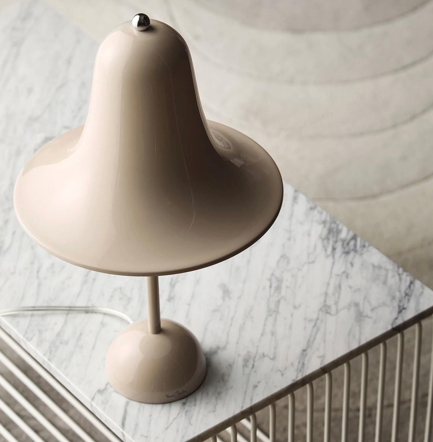 Verner Panton 'Pantop' table lamp in 'Grey Sand' for Verpan. Designed in 1980. New, current production.

The elegant Pantop line was designed by Verner Panton in 1980, and has for a long time been a staple of the Verpan collection. Pantop is