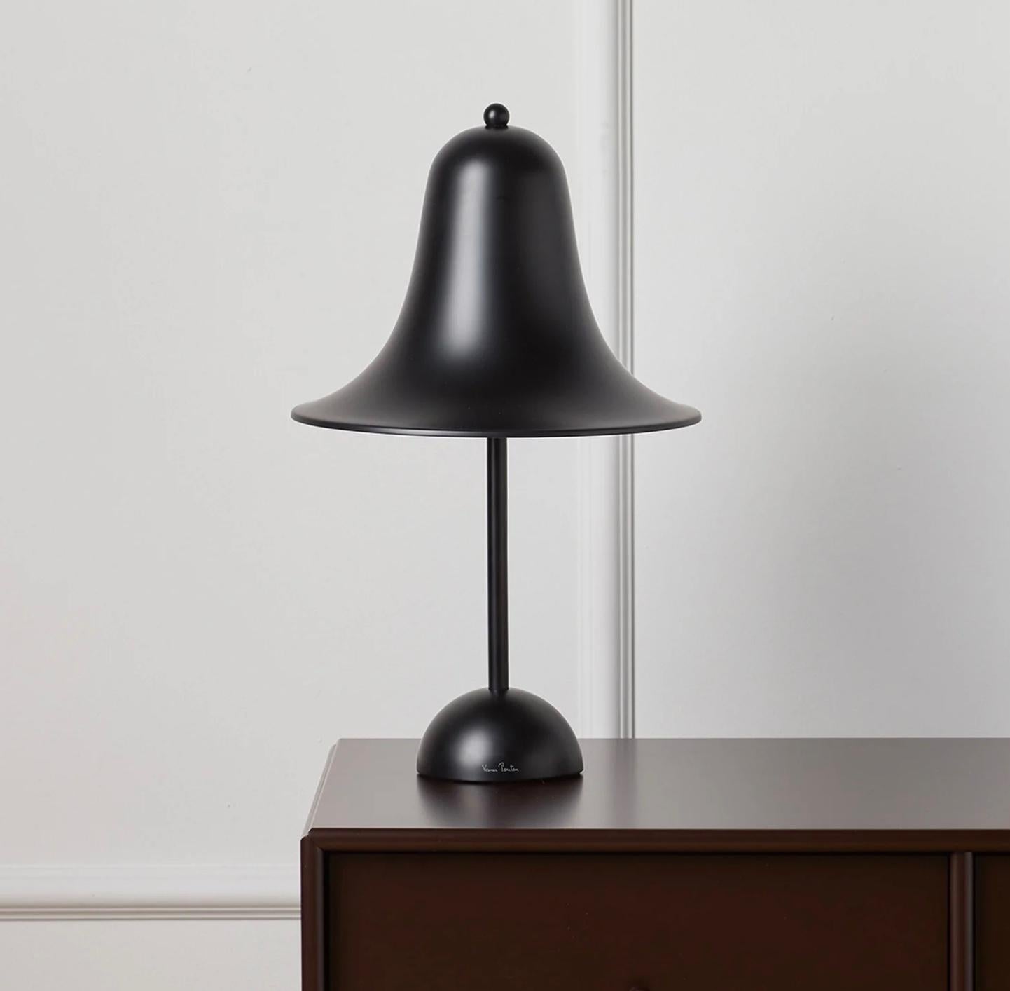 Verner Panton 'Pantop' table lamp in 'Matt Black' for Verpan. Designed in 1980. New, current production.

The elegant Pantop line was designed by Verner Panton in 1980, and has for a long time been a staple of the Verpan collection. Pantop is