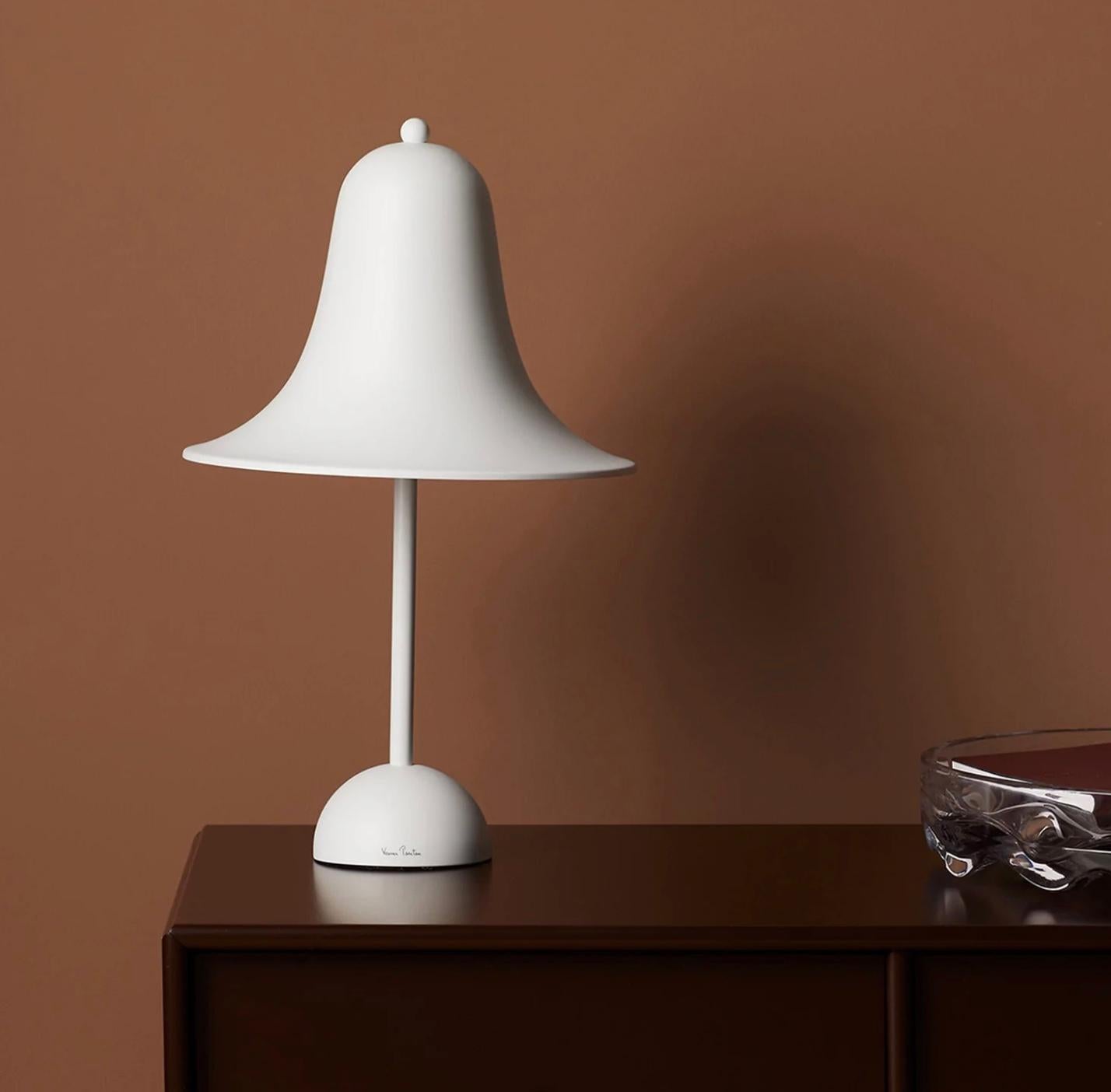 Verner Panton 'Pantop' table lamp in 'Matt White' for Verpan. Designed in 1980. New, current production.

The elegant Pantop line was designed by Verner Panton in 1980, and has for a long time been a staple of the Verpan collection. Pantop is