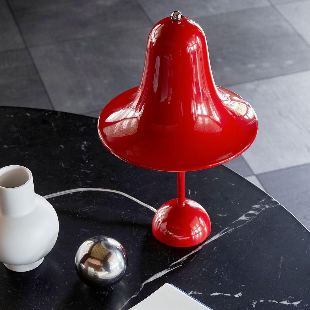 Verner Panton 'Pantop' table lamp in metal and bright red for Verpan

Verner Panton was one of Denmark's most legendary modern furniture and interior designers. His innovative experimentation with new materials, bold shapes and vibrant colors shines