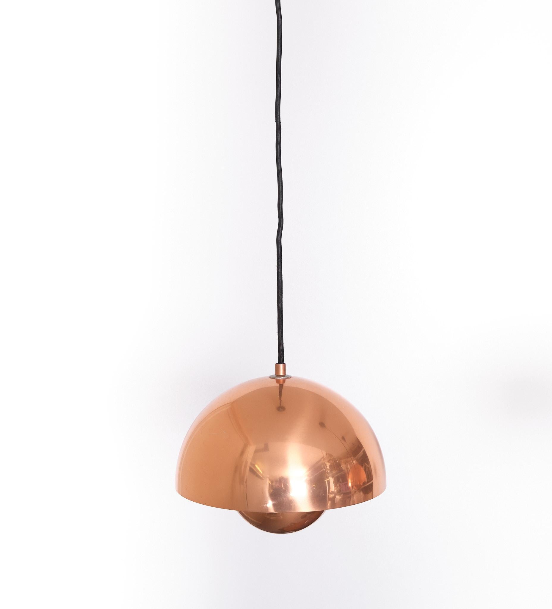 Very nice set of Three polished Copper Flower pot pendant lamps .Designed by Verner Panton for &Tradition . Lovely color and patine . 
signed . 
