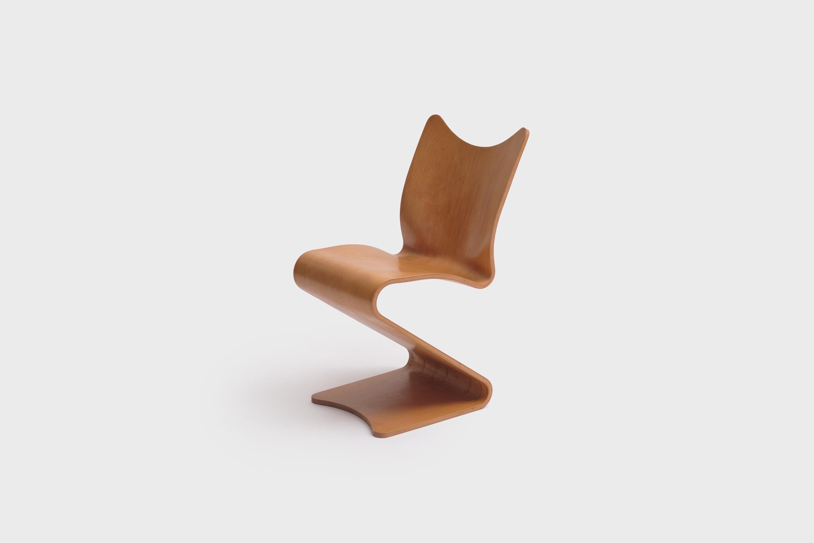 Rare pre-production S-chair model no. 275 from 1956 by Verner Panton. Sculptural multi curved plywood with surface in clear varnished beech. This is an exceptional version; it's made of 9 mm thick laminated wood and has a flat base, it has two