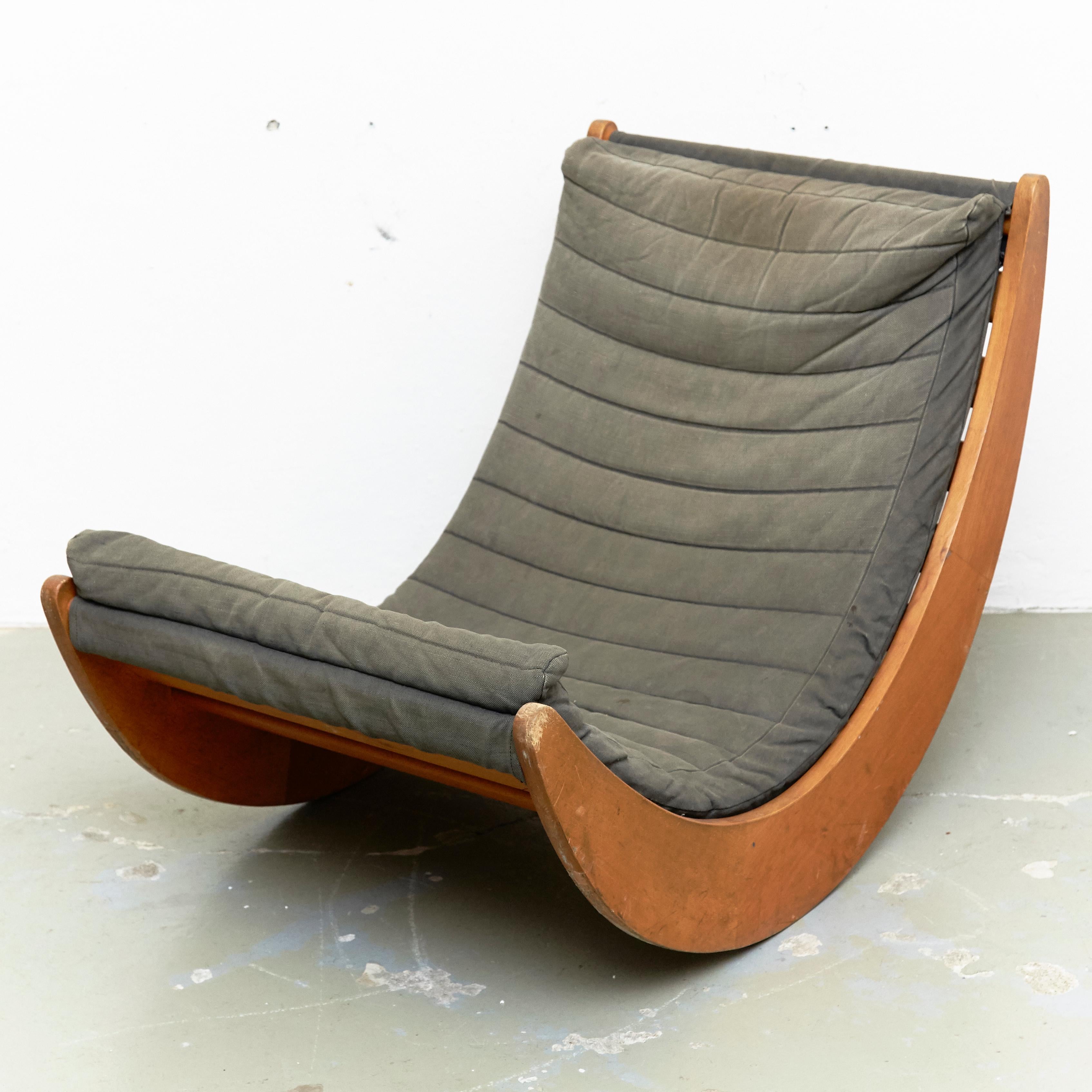Relaxer chair designed by Verner Panton circa 1970, manufactured for Rosenthal in Denmark.

In original condition, with minor wear consistent with age and use, preserving a beautiful patina. The wood has some scratches and the upholstery has some