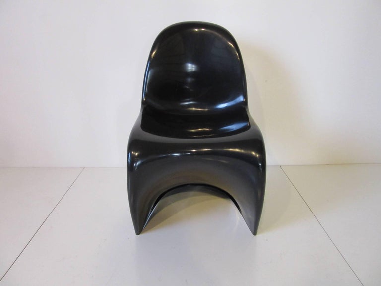 A black molded plastic Panton S chair manufactured by Herman Miller retains the in mold marking dated 1973.