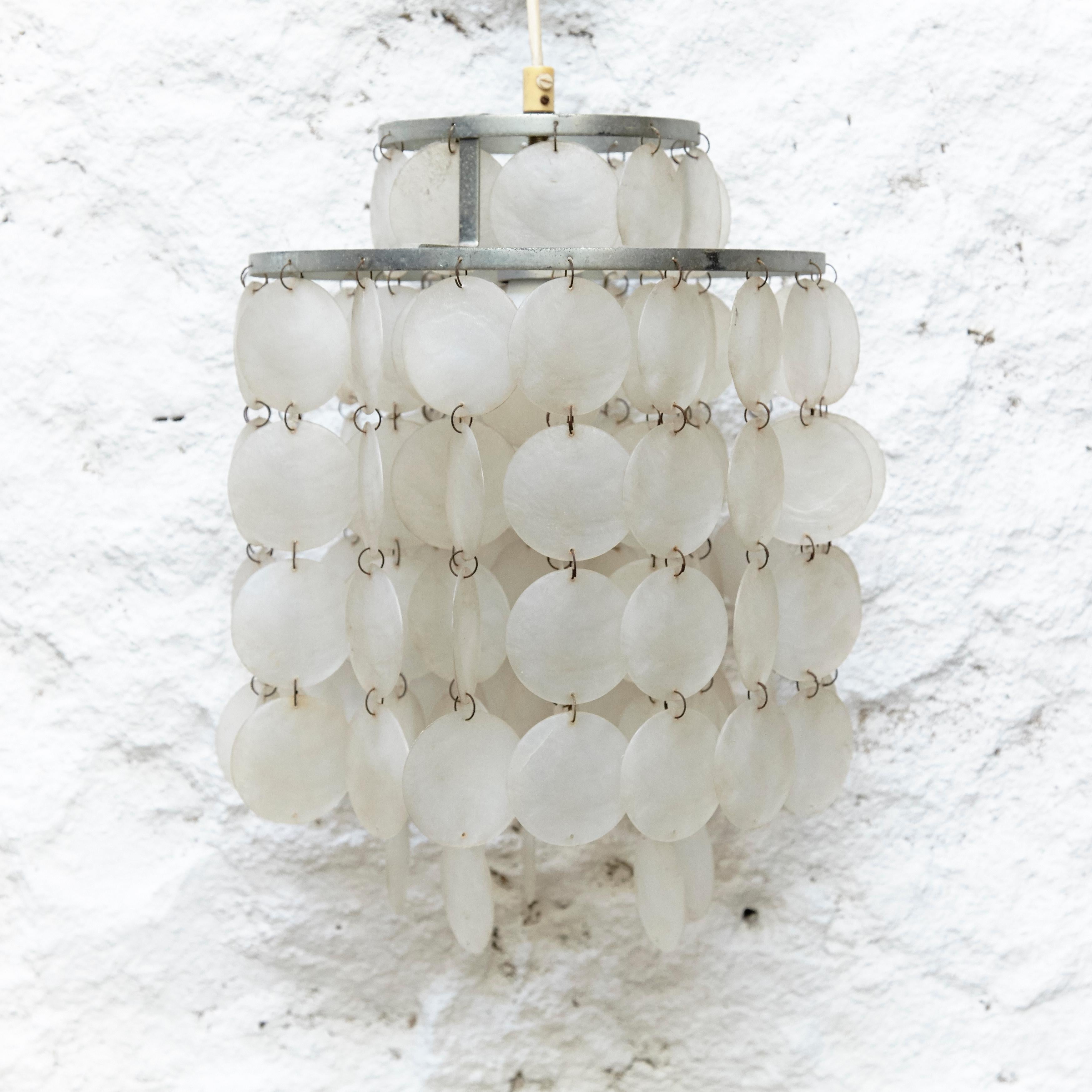 Verner Panton style Capiz Shell chandelier lamp, circa 1970

Chandelier lamp made by Capiz Shell manufactured circa 1970.

In original condition, with minor wear consistent with age and use, preserving a beautiful patina.
  