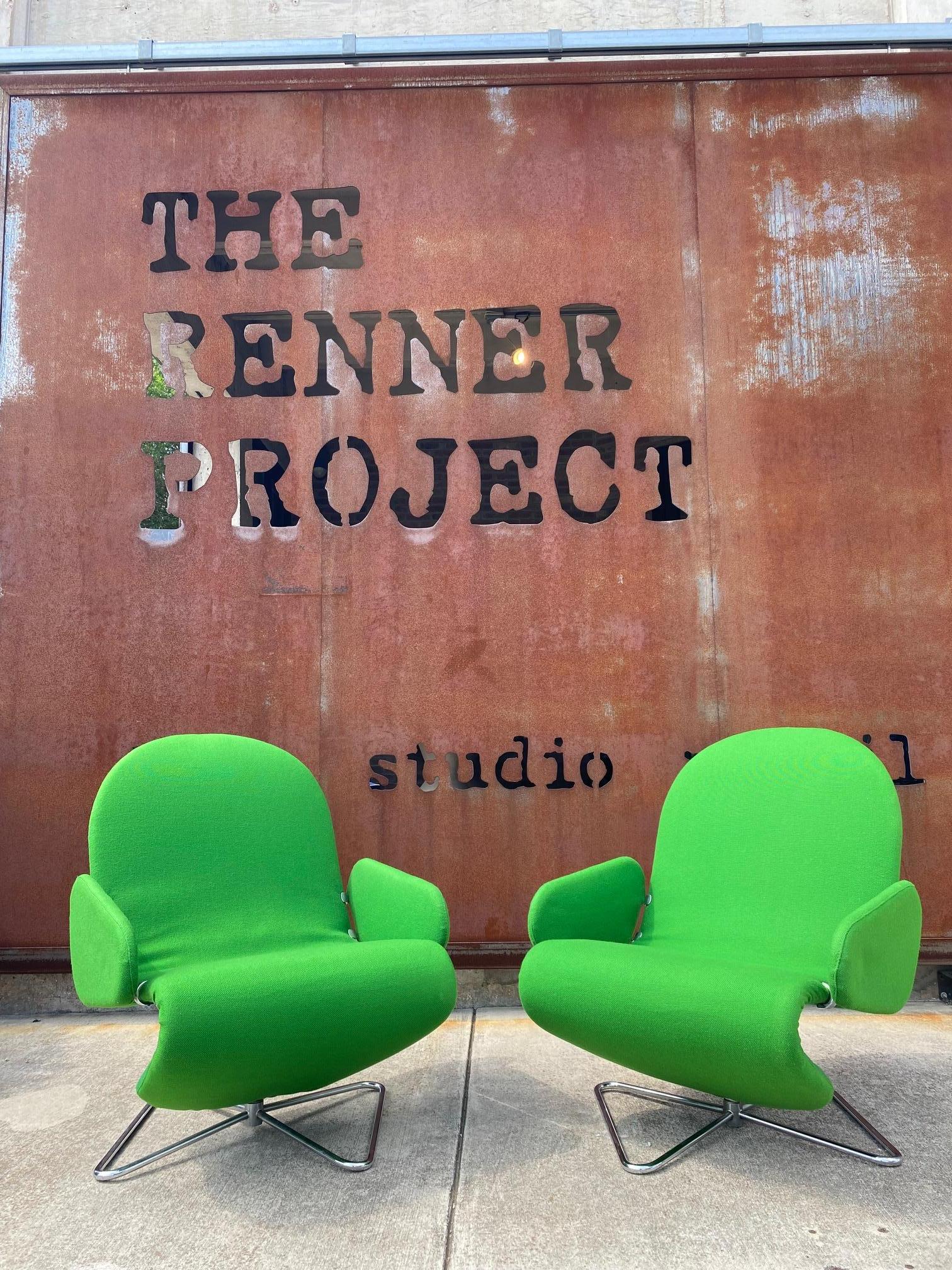 Matched pair of original Verner Panton System 123 swivel chairs for Fritz Hansen. Low lounge profile chairs swivel on tubular chromed metal bases. Kelly green woven wool fabric is not original yet looks period and is in excellent condition. Chairs
