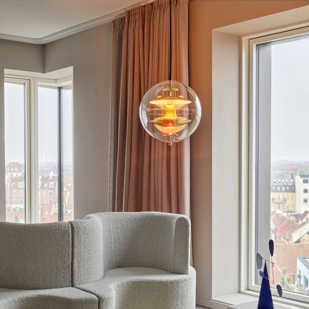 Verner Panton 'VP Globe' pendant lamp in brass, aluminum and acrylic for Verpan

Verner Panton was one of Denmark's most legendary modern furniture and interior designers. His innovative experimentation with new materials, bold shapes and vibrant