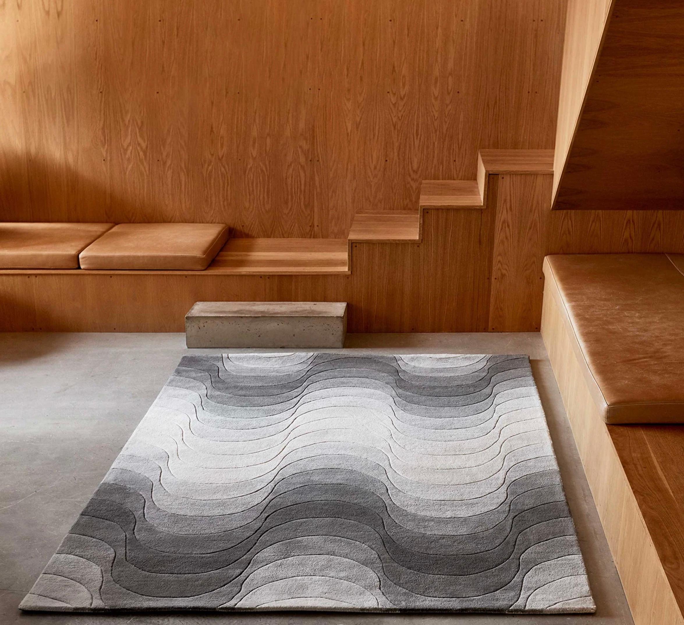 Verner Panton 'Wave' Rug 240 x 170cm for Verpan. Current production.

As well as adding a sculptural feature to a room, rugs also serve to emphasize and/or transform the dimensions of the space. All Verpan carpets are made from hand-woven 100% New