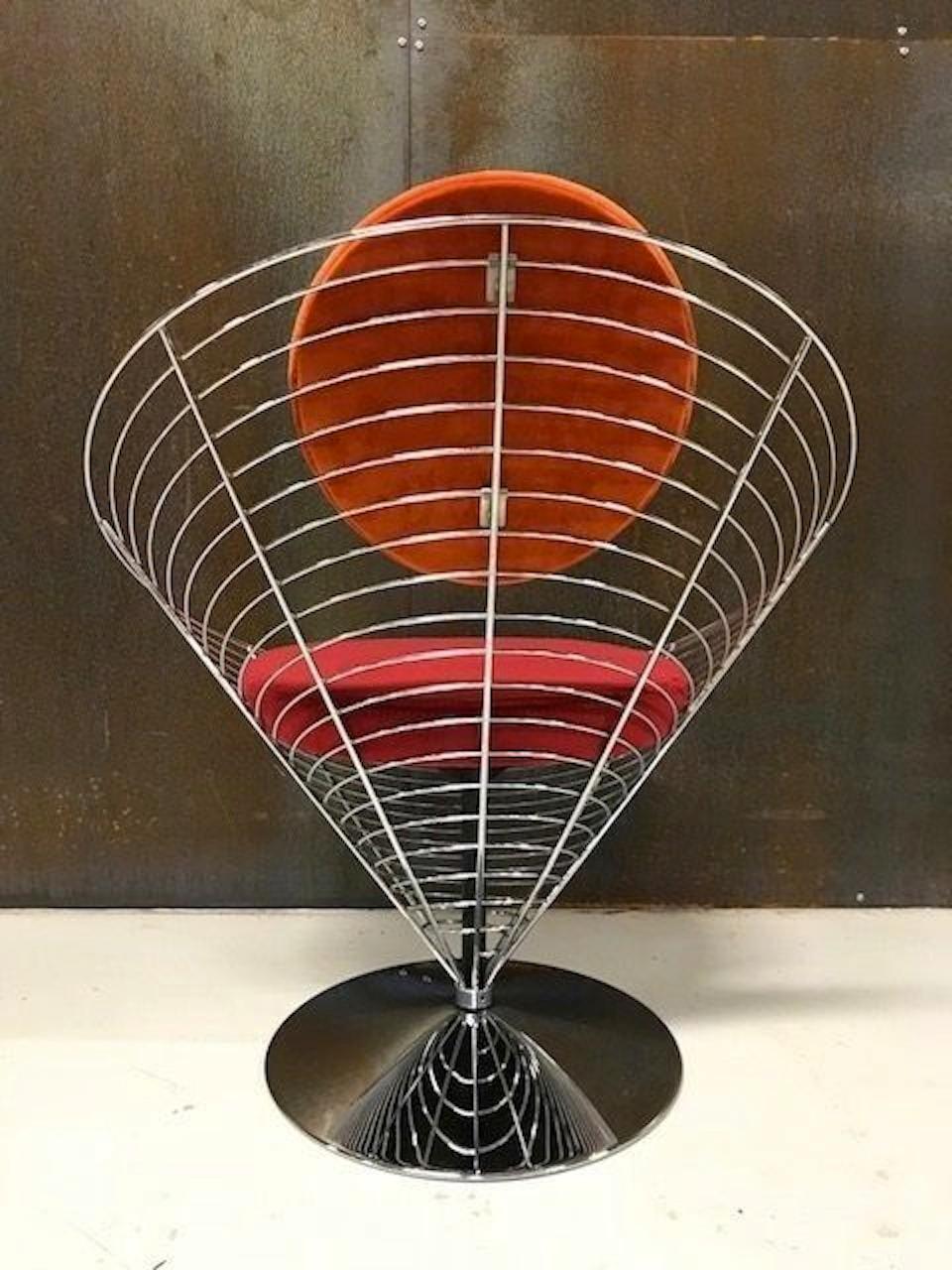 Verner Panton cone wire swivel chair model V-8800 the unique combination of materials and geometric composition of Panton's cone chair converge to create a functional work of (pop) art. Produced by Fritz Hansen Denmark during late 1950s. No longer