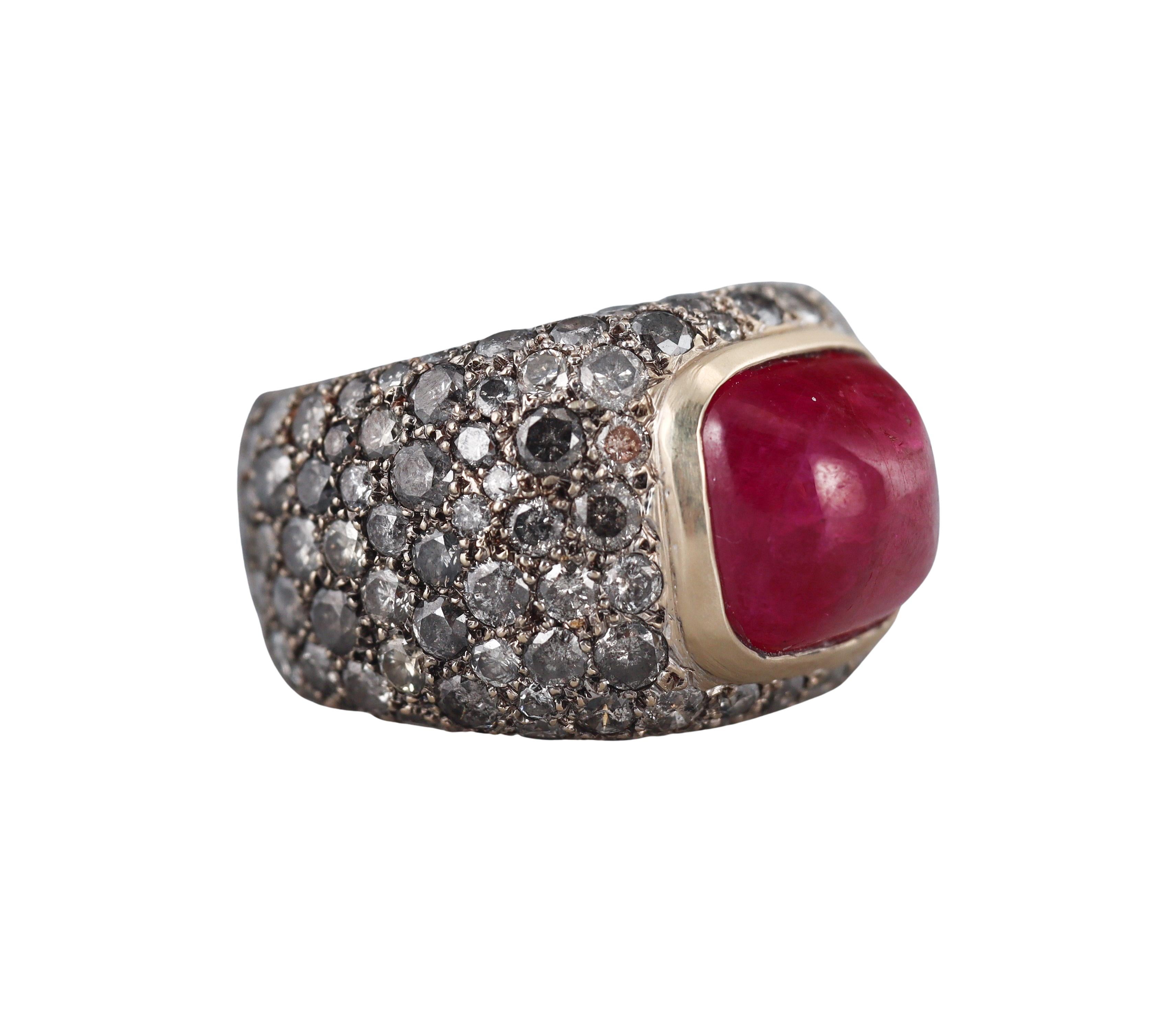 An 18k yellow gold ring by Verney Paris, set with approx. 4.50ctw in diamonds and center approx. 14ct ruby ( stone measures 12.5 x 11.9 x 8.8mm).
Ring size 6m width is 18mm.
Marked Verney Paris.
Weight - 22.9 grams. 