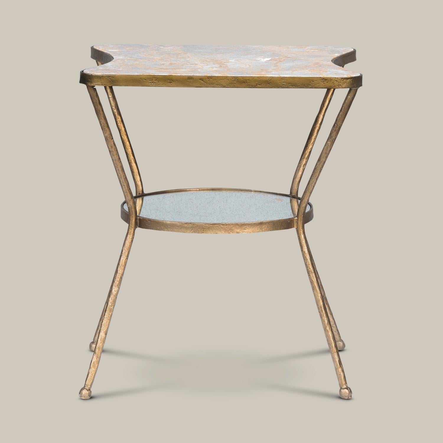 Blush marble top, hammered antique brass, and reflective antique mirror form a delicate silhouette with strong lines in this side table. Handmade by artisans in Vietnam, this side adds a gorgeous element to any space.