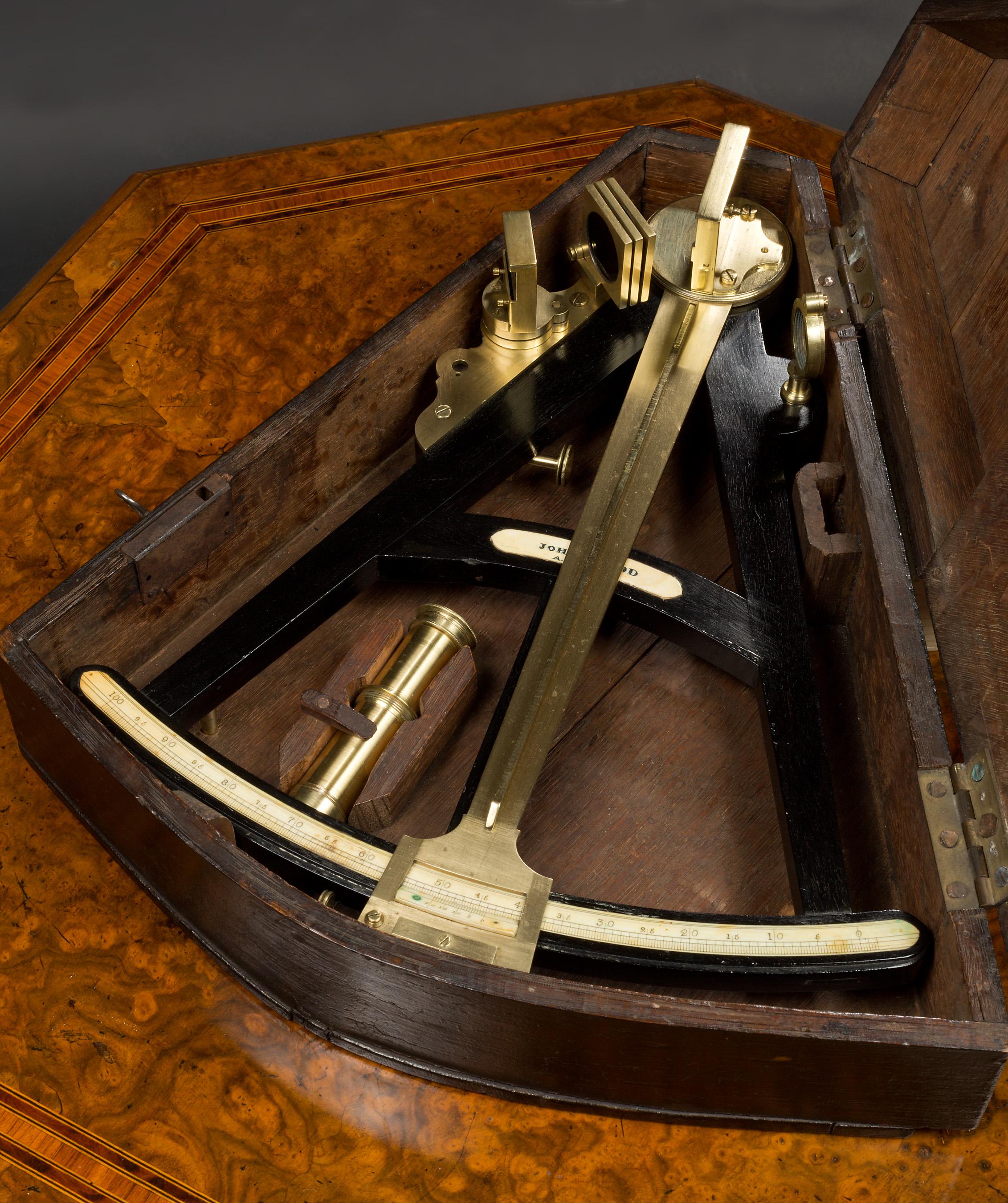 Vernier Octant by John Todd, London, circa 1850. 

An eleven inch radius vernier octant by John Todd with ebonised wooden frame with inset bone scale marked from 0 – 100 degrees with inset makers bone plaque. 

Lacquered brass index arm, pinhole