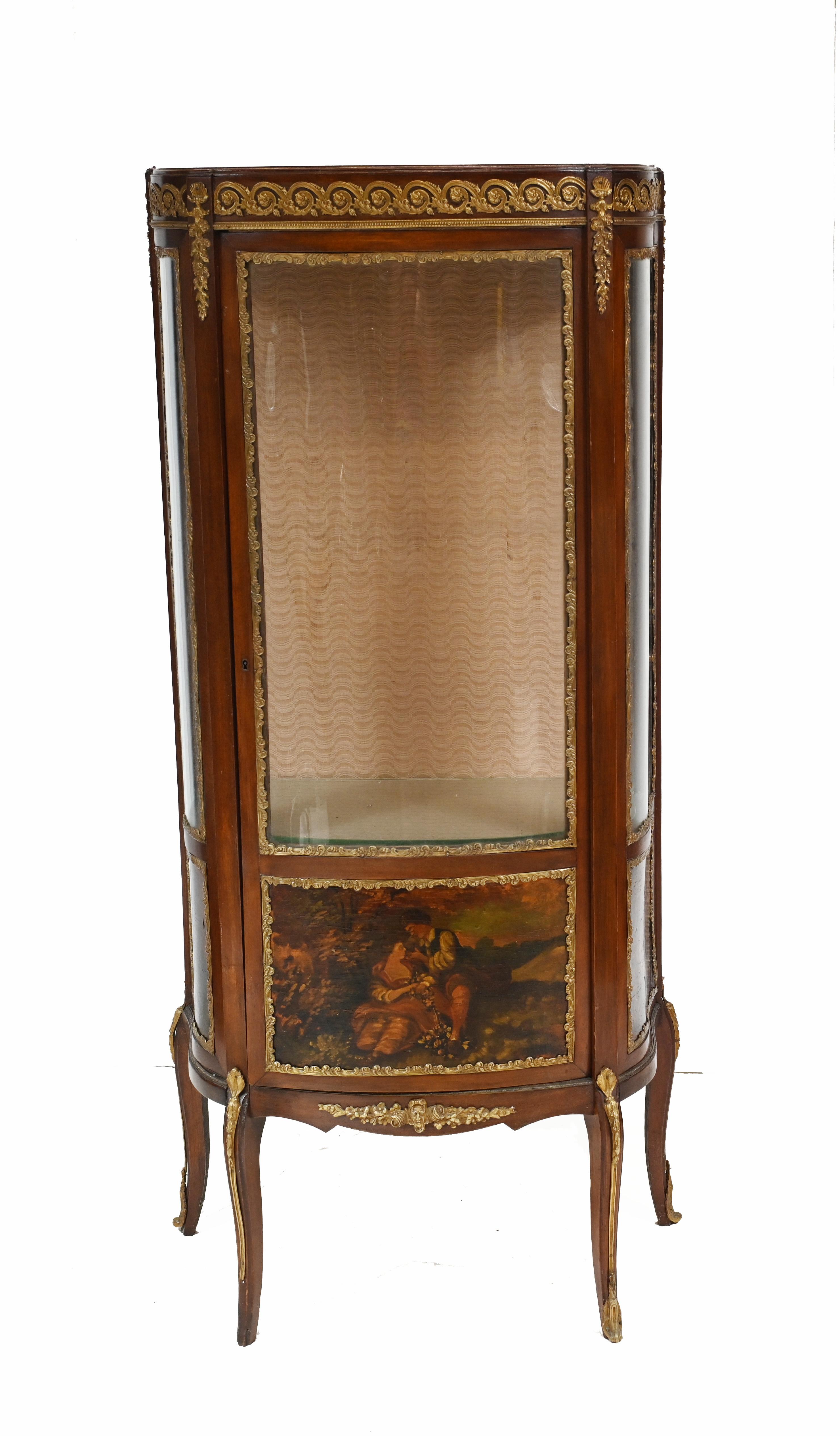 Gorgeous antique French Empire display cabinet or bijouterie
We date this wonderful antique to circa 1910
Lovely shape and interplay between colours of wood, ormolu and red felt lined interior
Purchased from Les Puces flea market in Paris
Hand