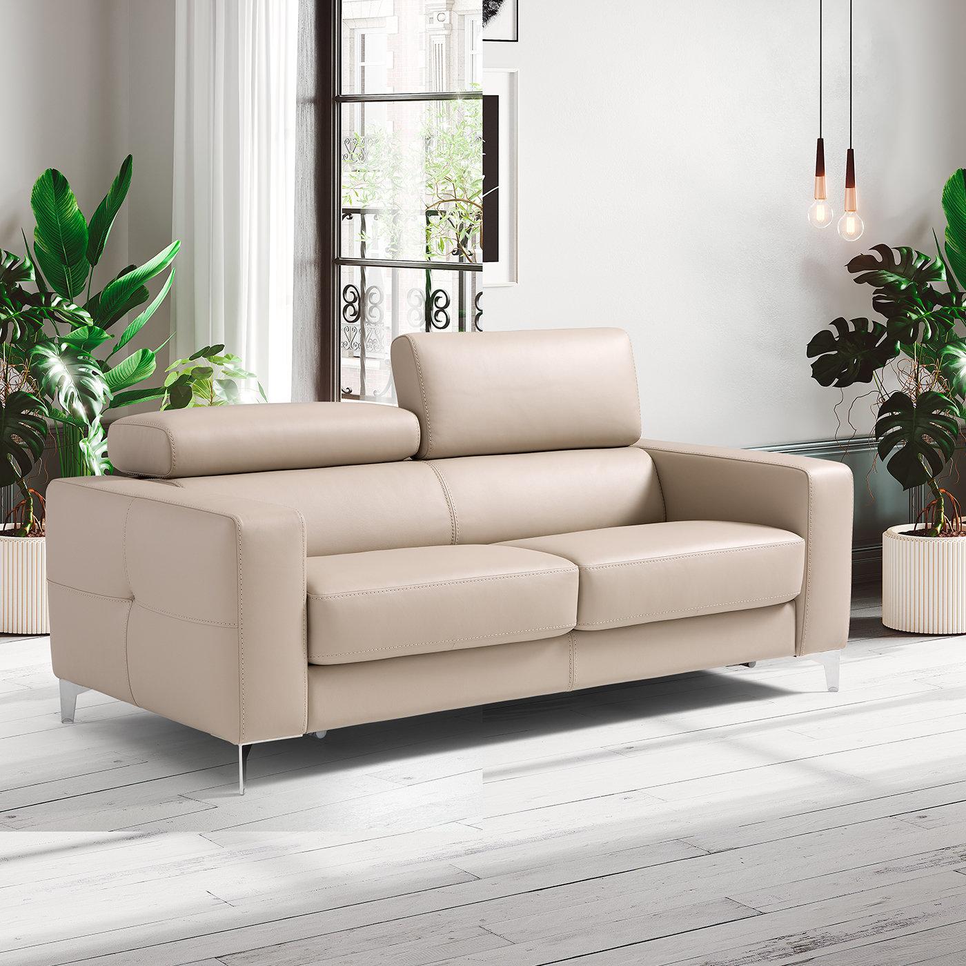 Raised on luminous and compact metal feet, this sofa bed is the epitome of modern style and impeccable comfort. Subtle quilted details add aesthetic appeal to the smooth, beige-toned leather upholstery, which increases the comfort provided by the